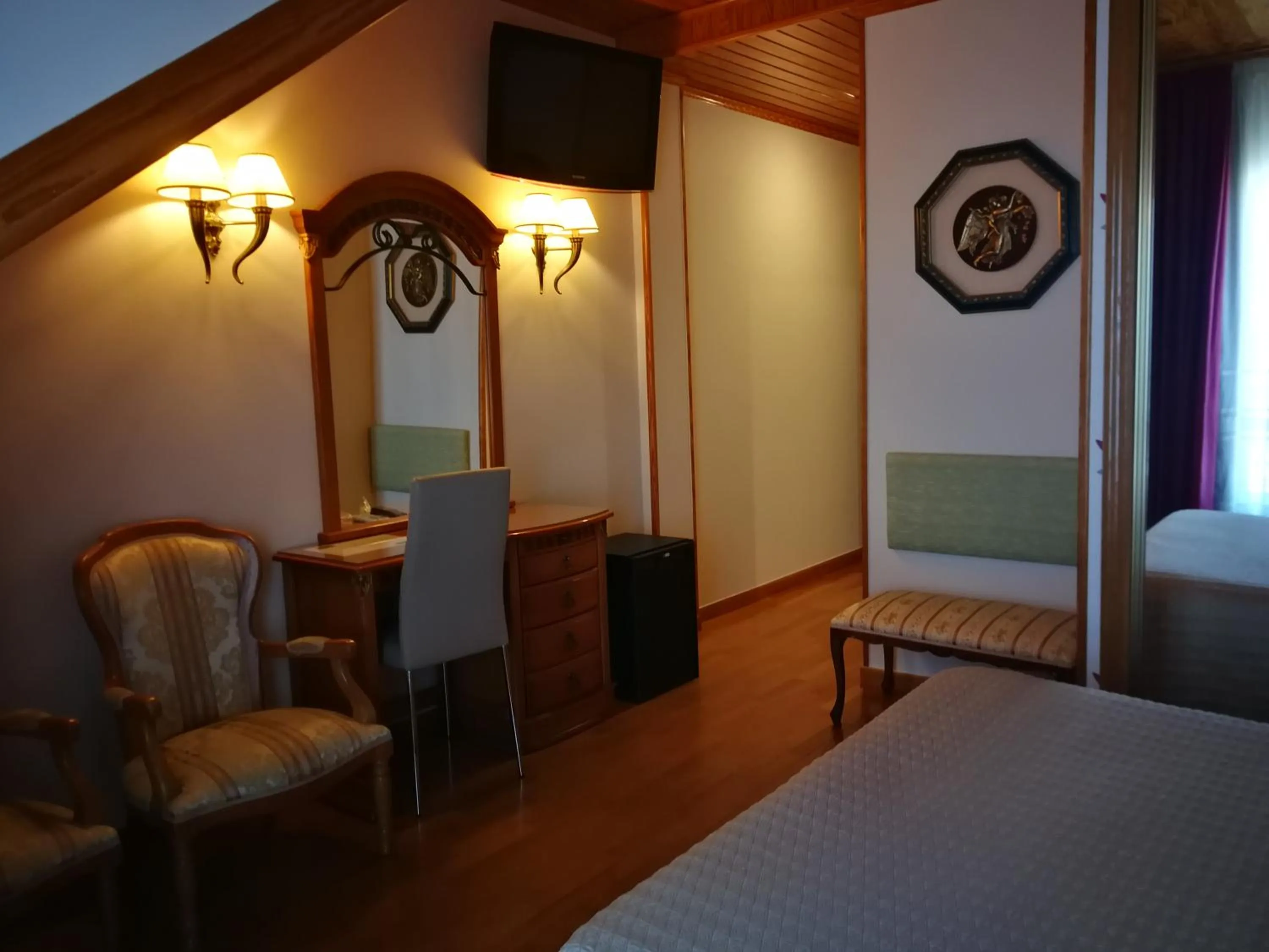 Seating area, Bed in Hotel Playa Compostela