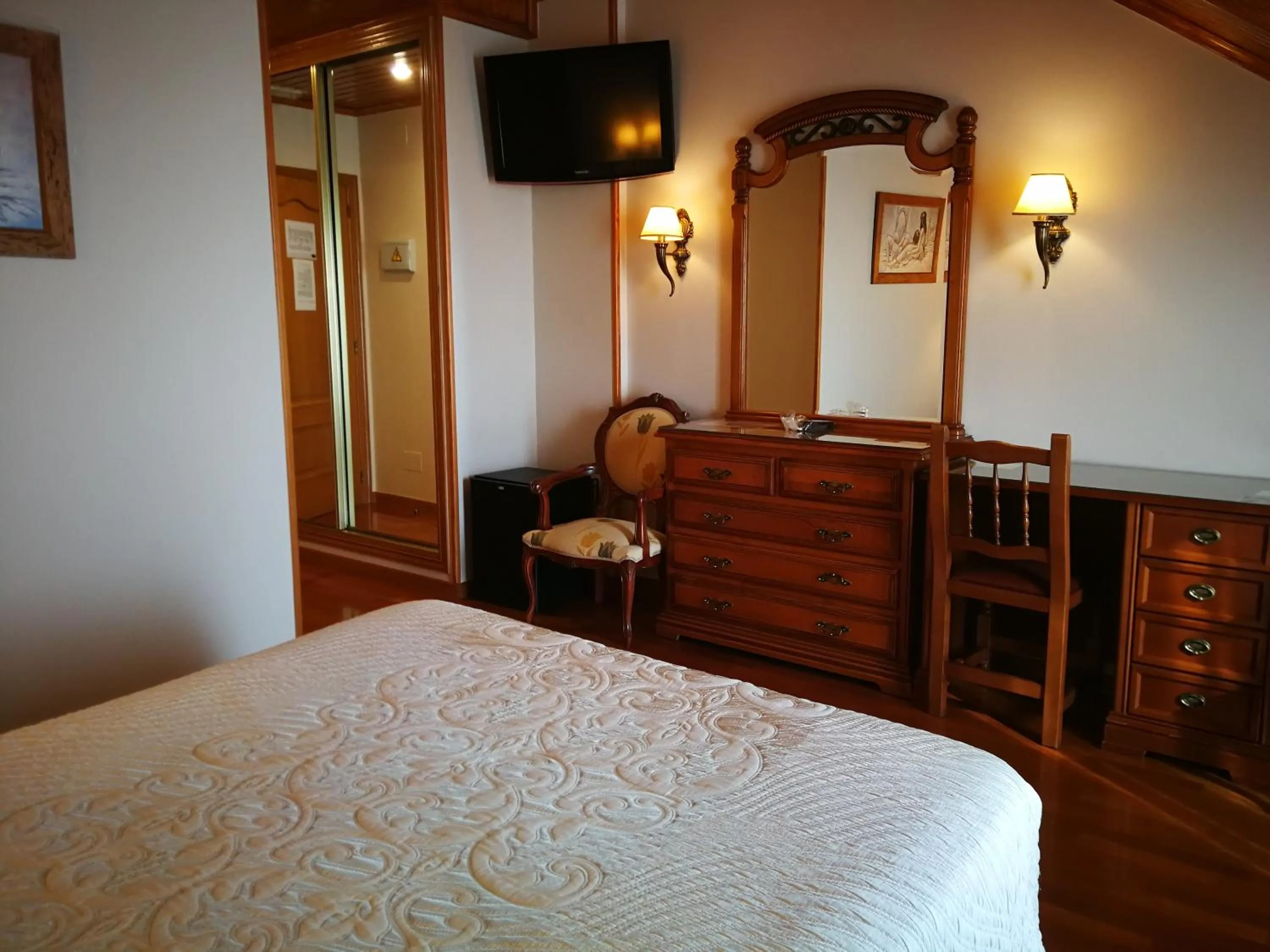 Photo of the whole room, Bed in Hotel Playa Compostela