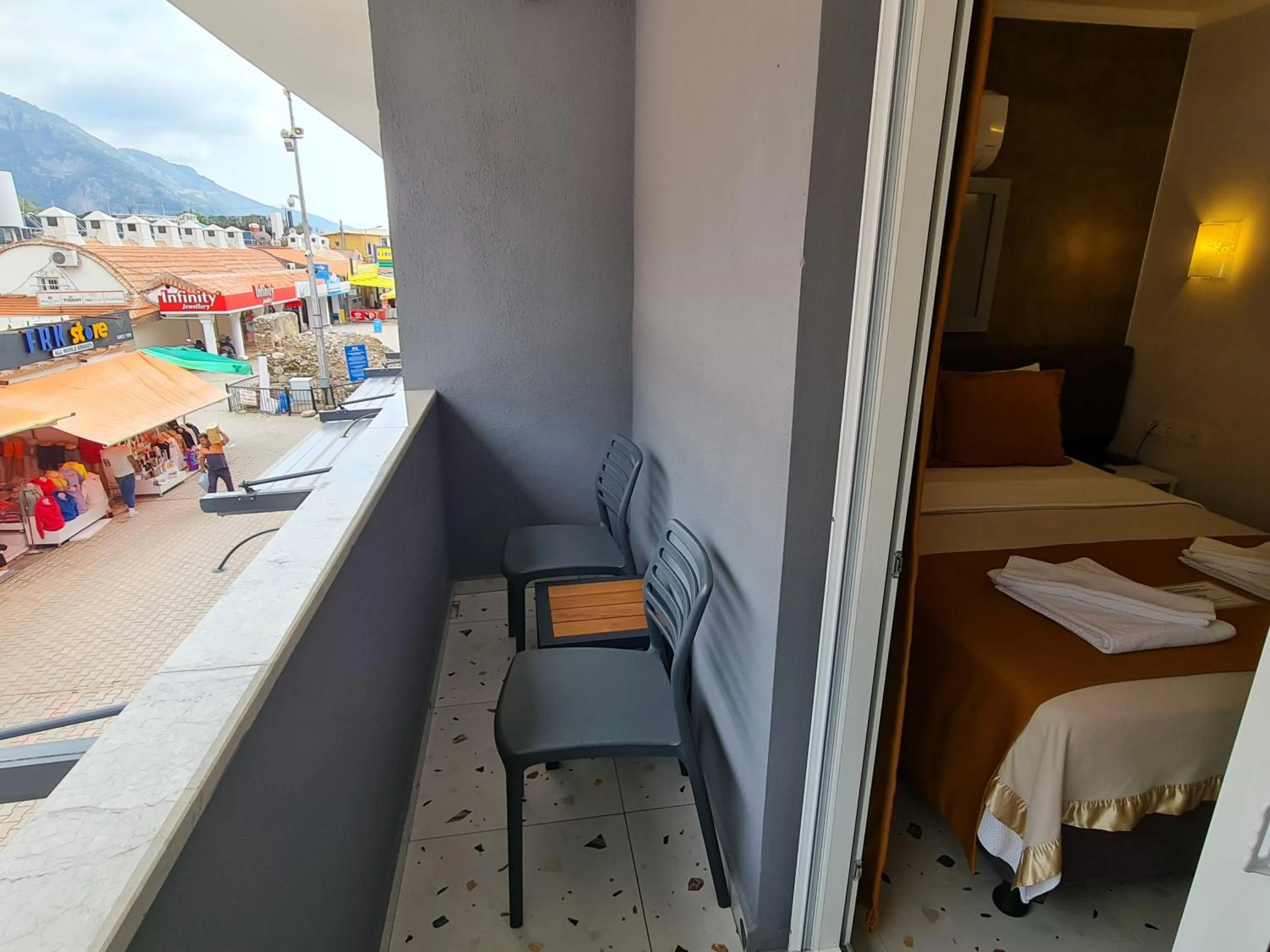 Balcony/Terrace, Bed in Tonoz Beach Hotel