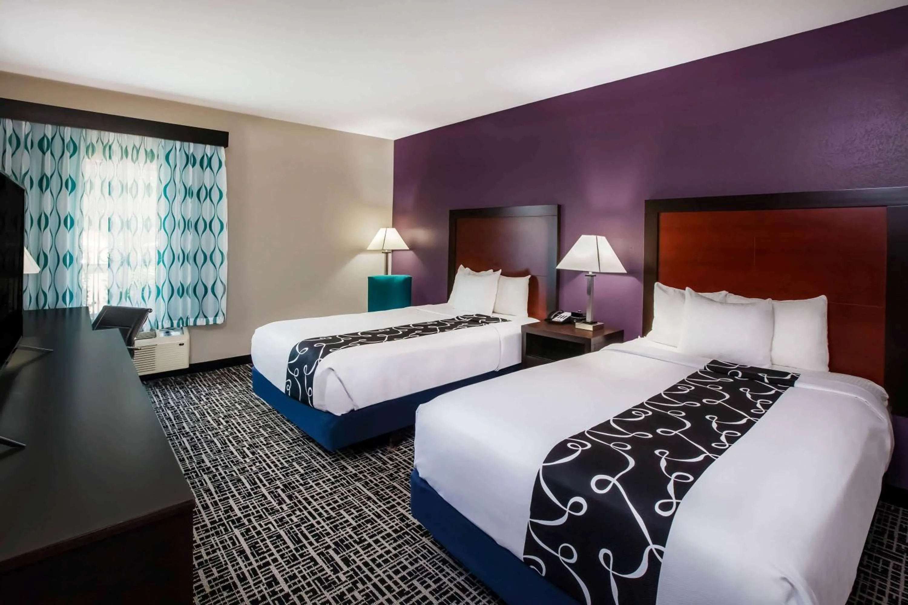 Photo of the whole room, Bed in La Quinta by Wyndham Lubbock North