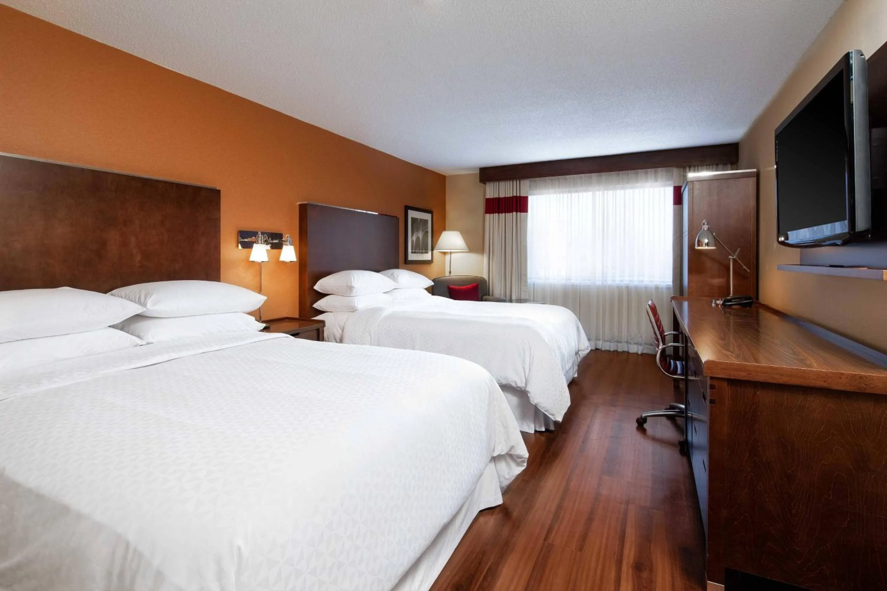 Photo of the whole room, Bed in Four Points by Sheraton Edmundston Hotel & Conference Center