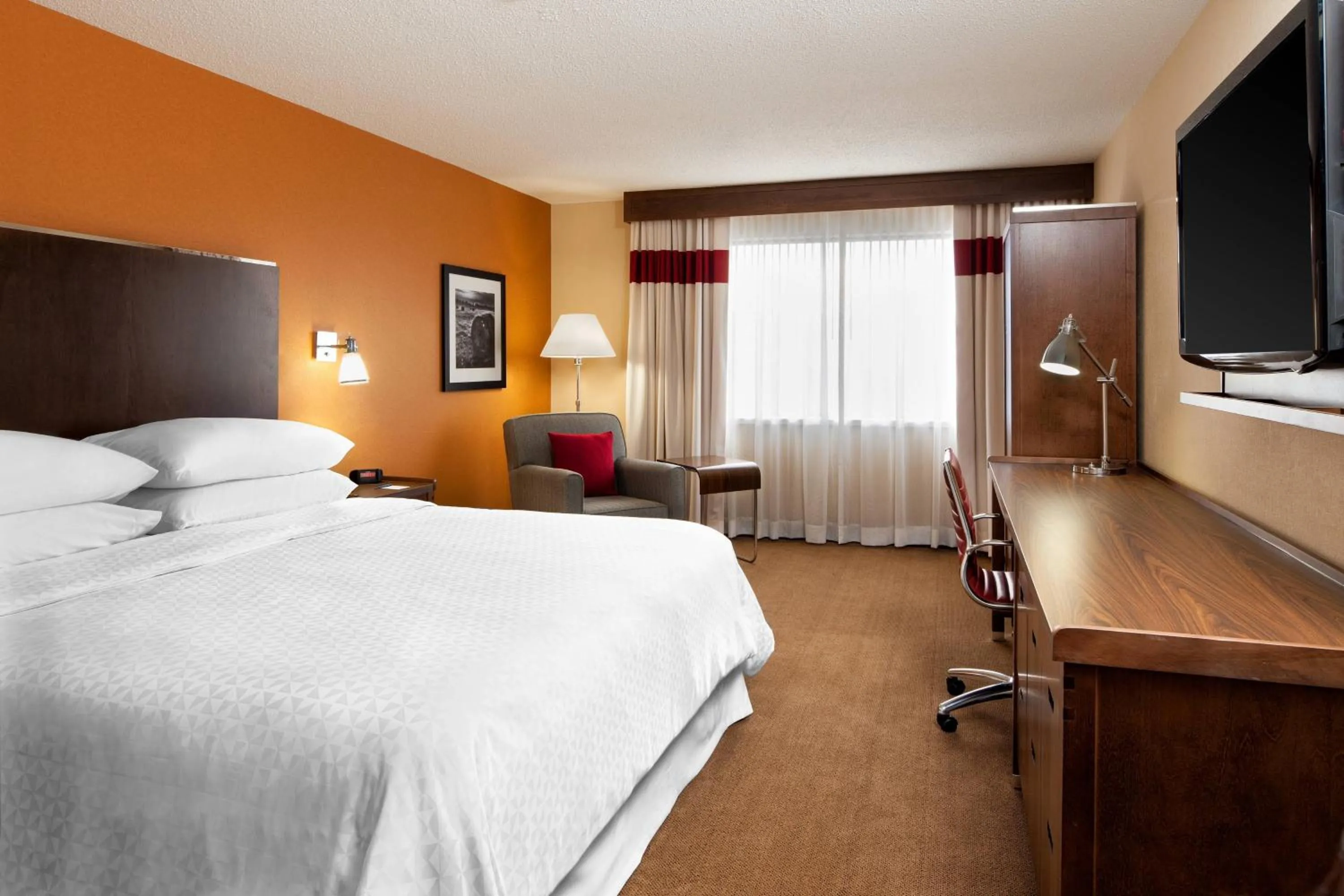 Photo of the whole room, Bed in Four Points by Sheraton Edmundston Hotel & Conference Center