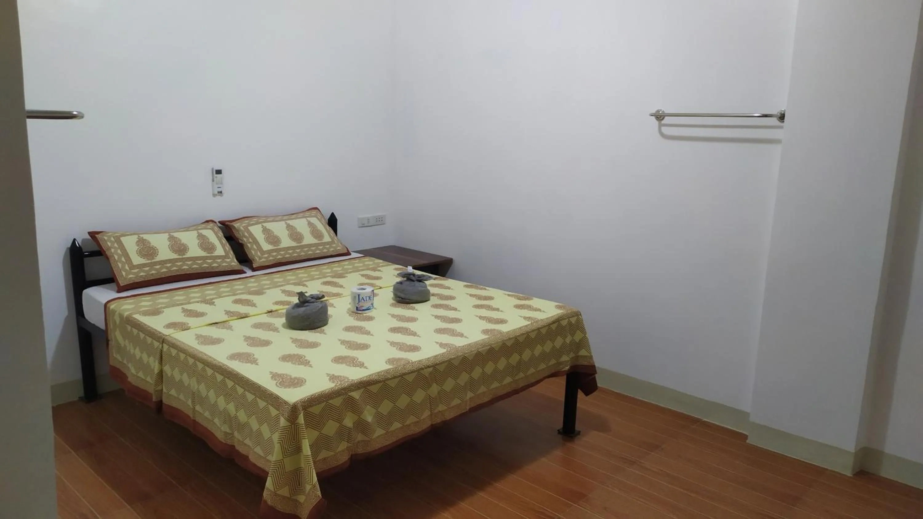 Bed in Hotel Ashoka (Authentic Indian Cuisine)