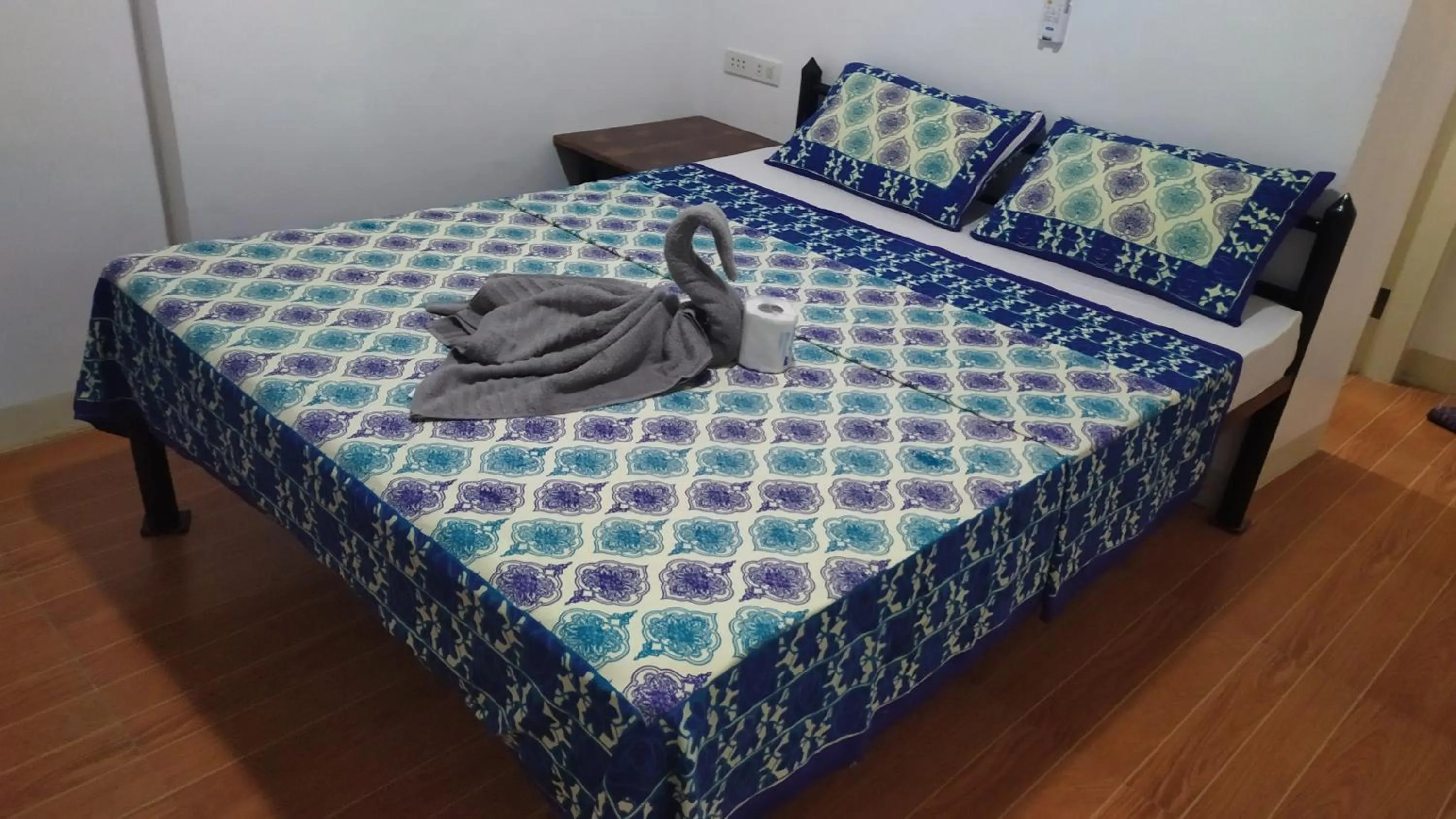 Bed in Hotel Ashoka (Authentic Indian Cuisine)