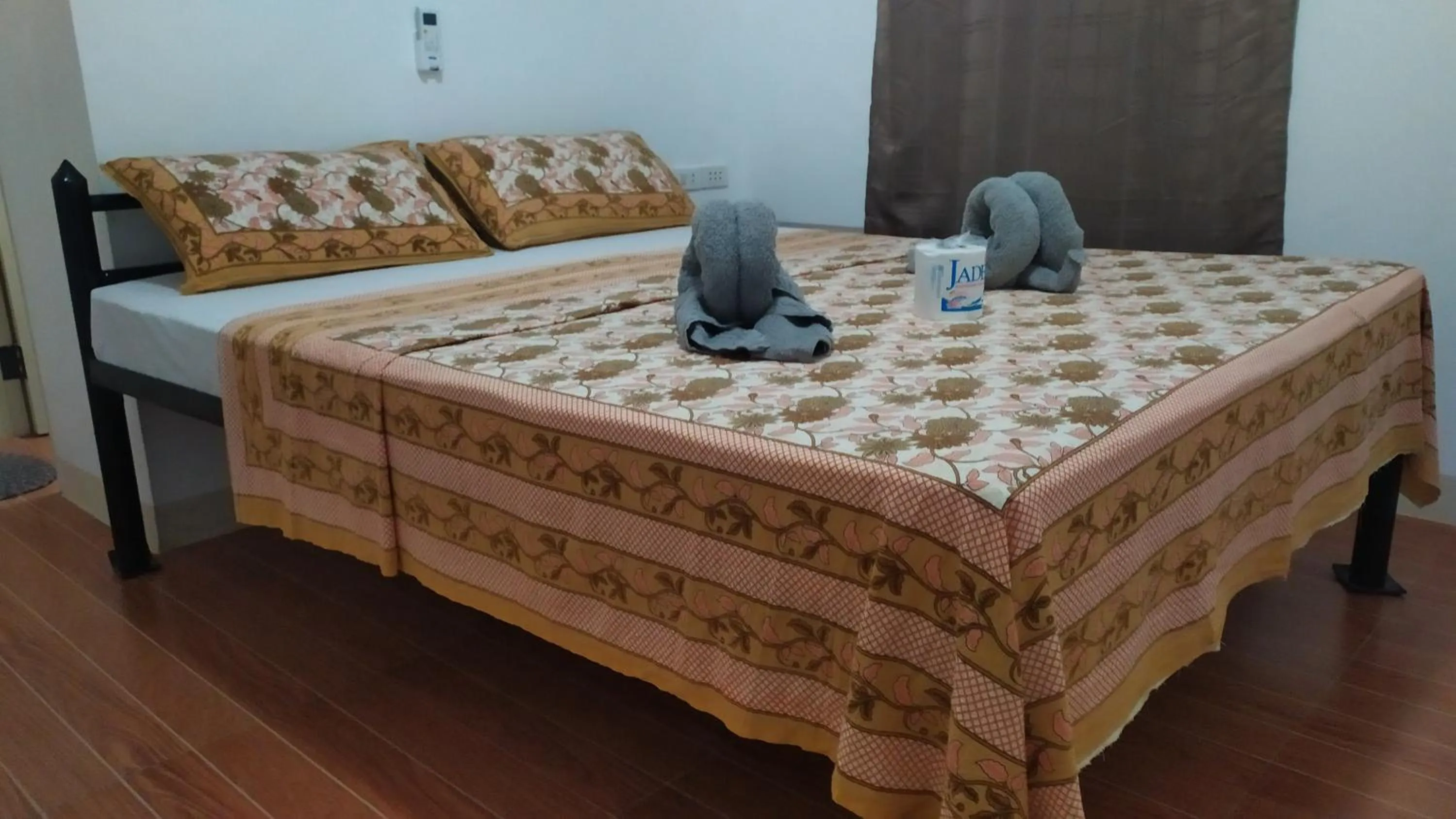 Bed in Hotel Ashoka (Authentic Indian Cuisine)