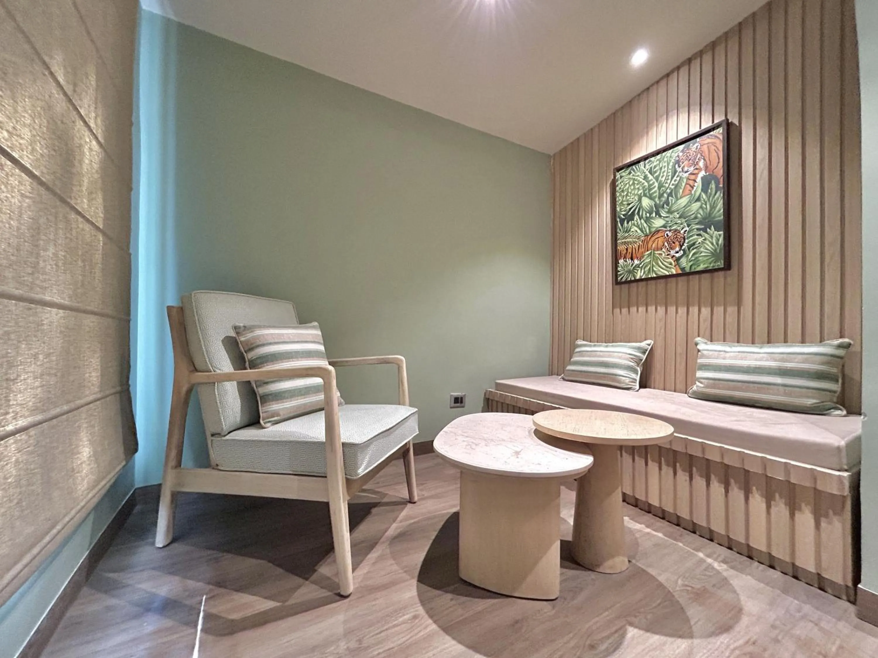 Seating area, Bed in Manu Maharani Resort