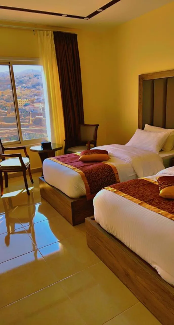 Bed in Shaqilath Hotel