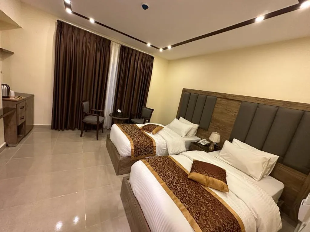 Bed in Shaqilath Hotel