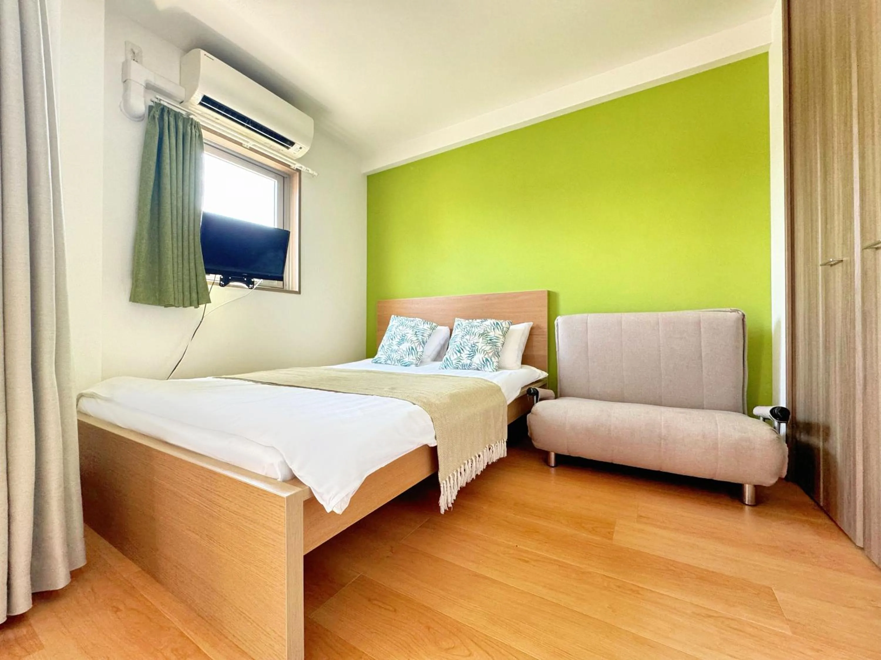 Bed in Juso AFP Apartment Hotel