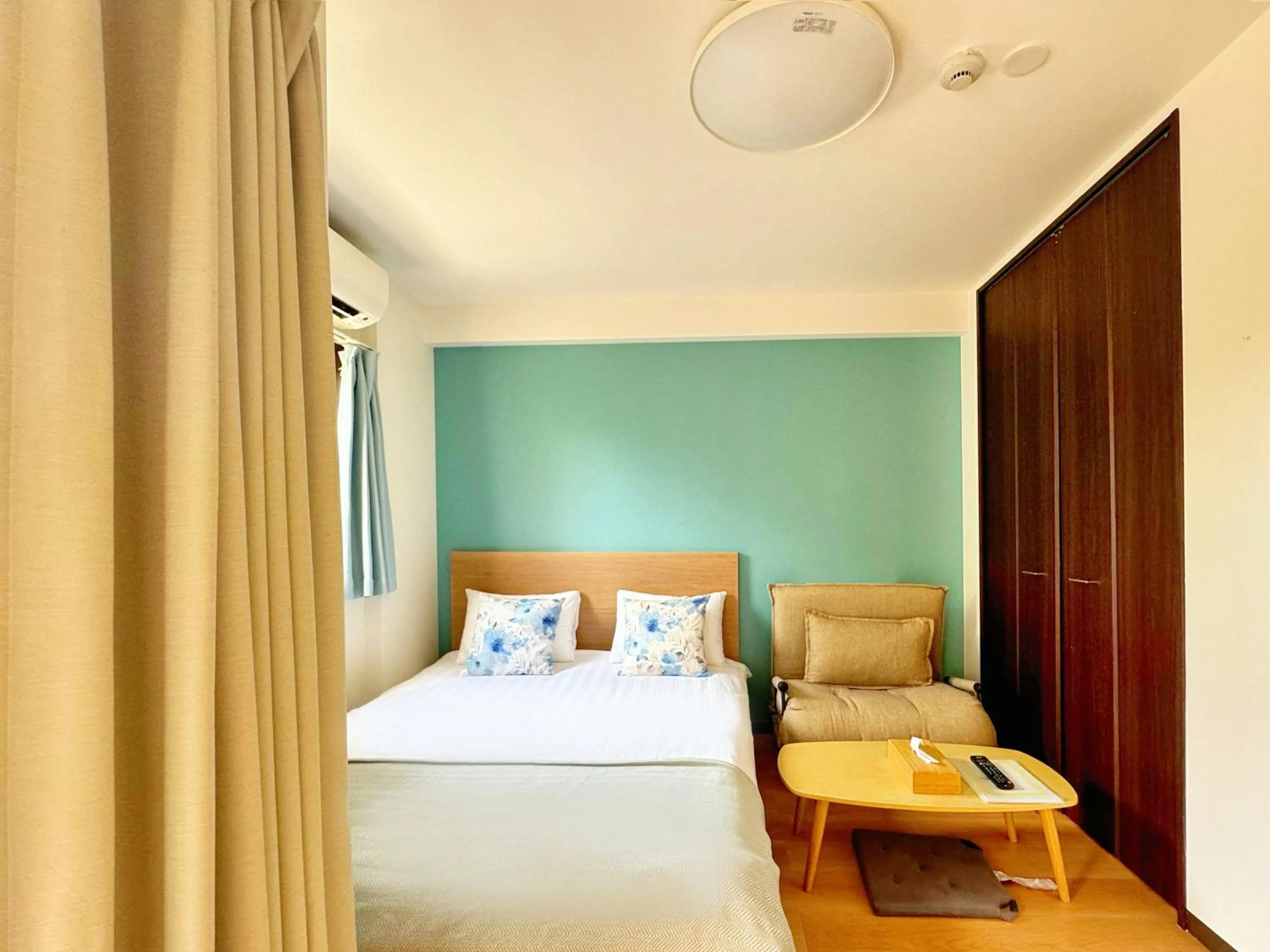 Bed in Juso AFP Apartment Hotel