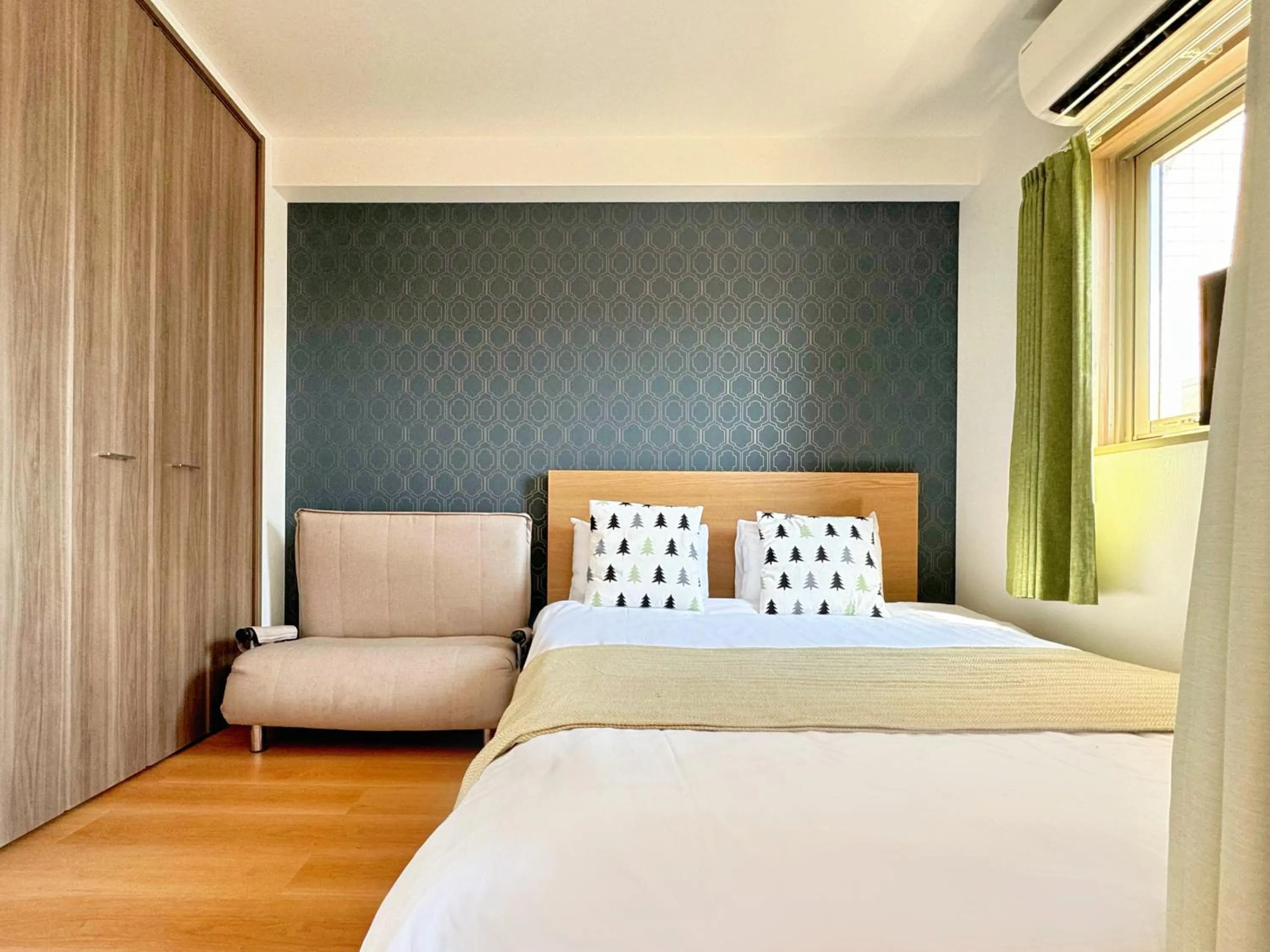 Bed in Juso AFP Apartment Hotel