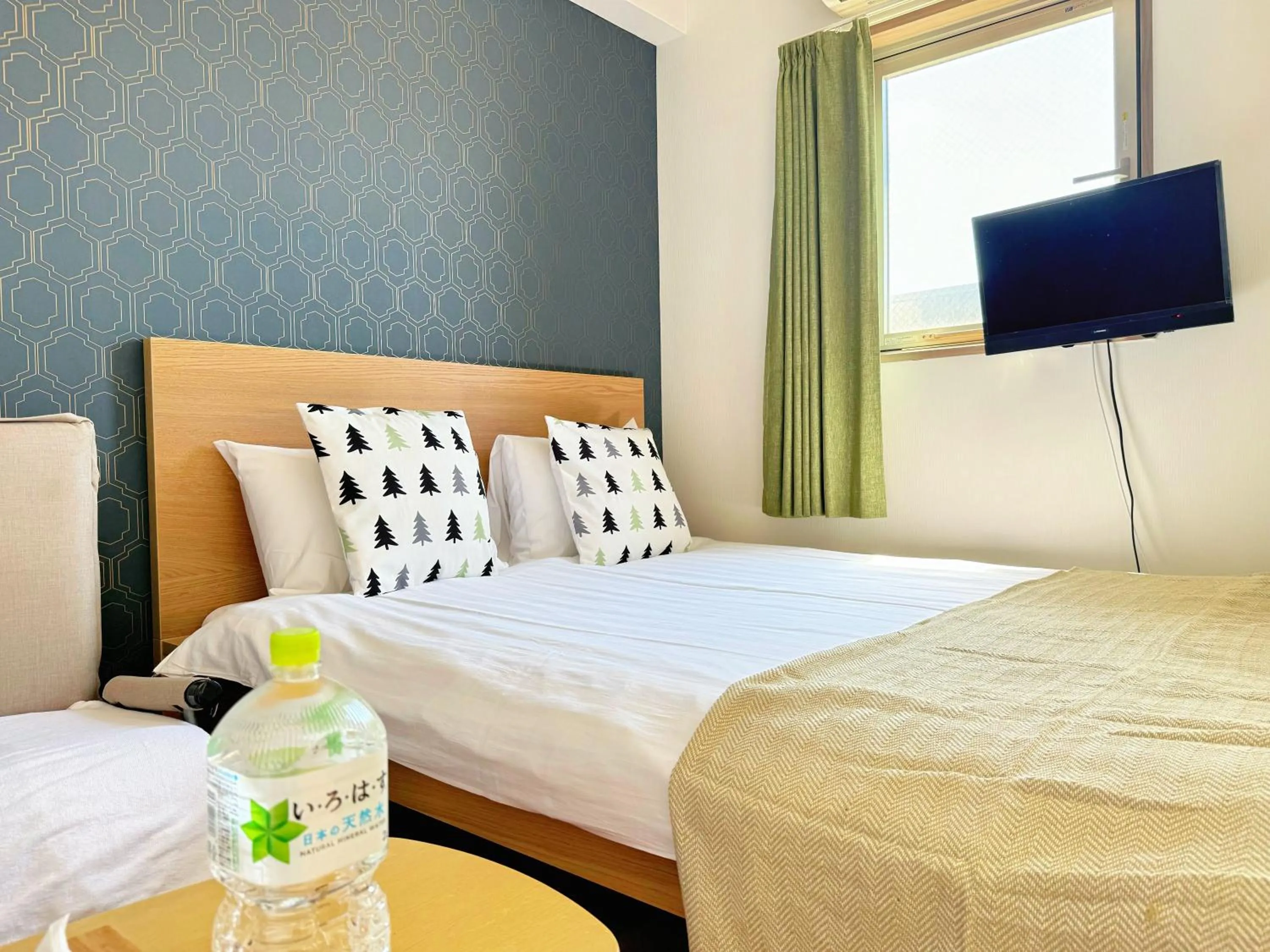 Bed in Juso AFP Apartment Hotel