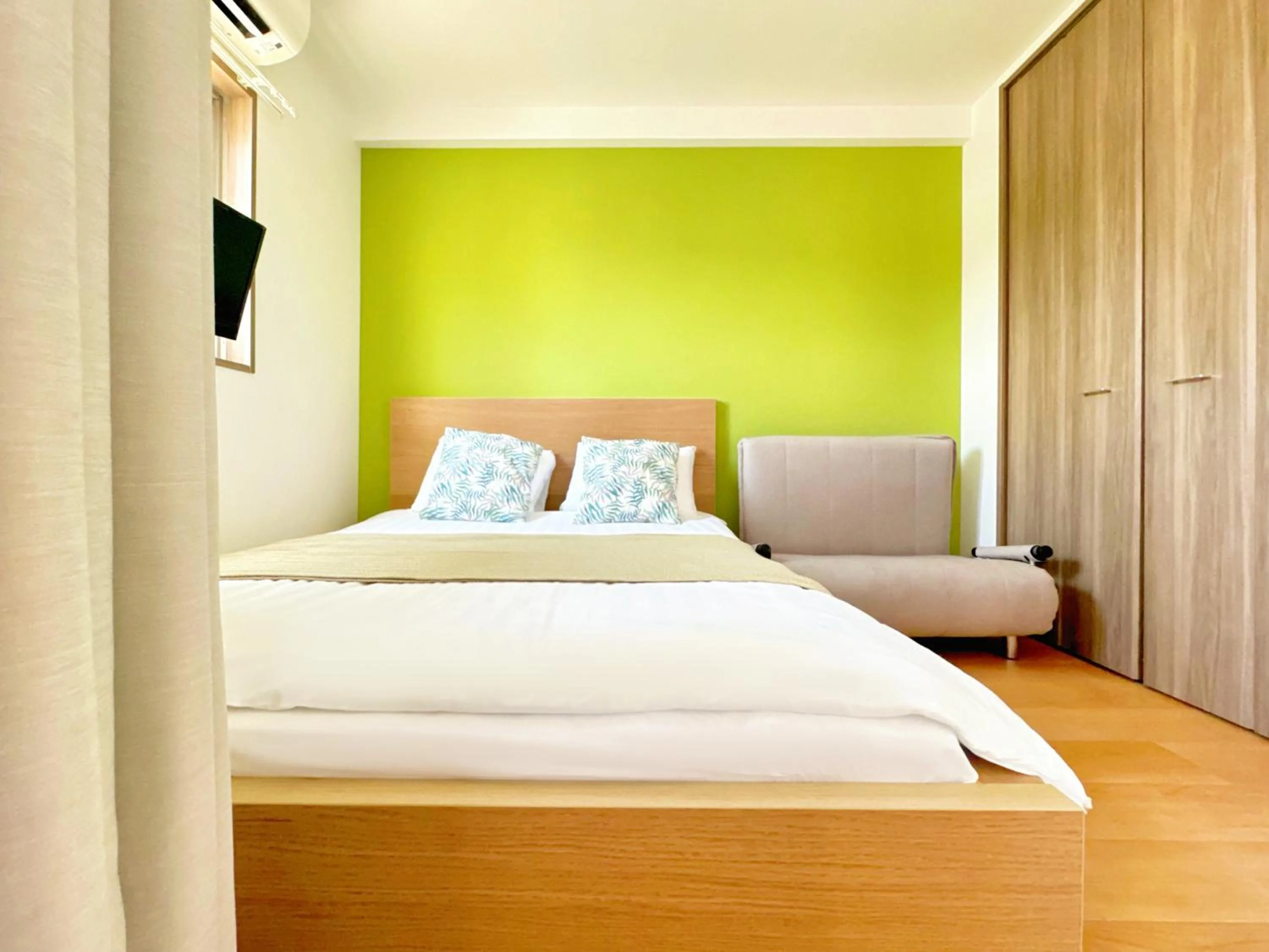 Bed in Juso AFP Apartment Hotel