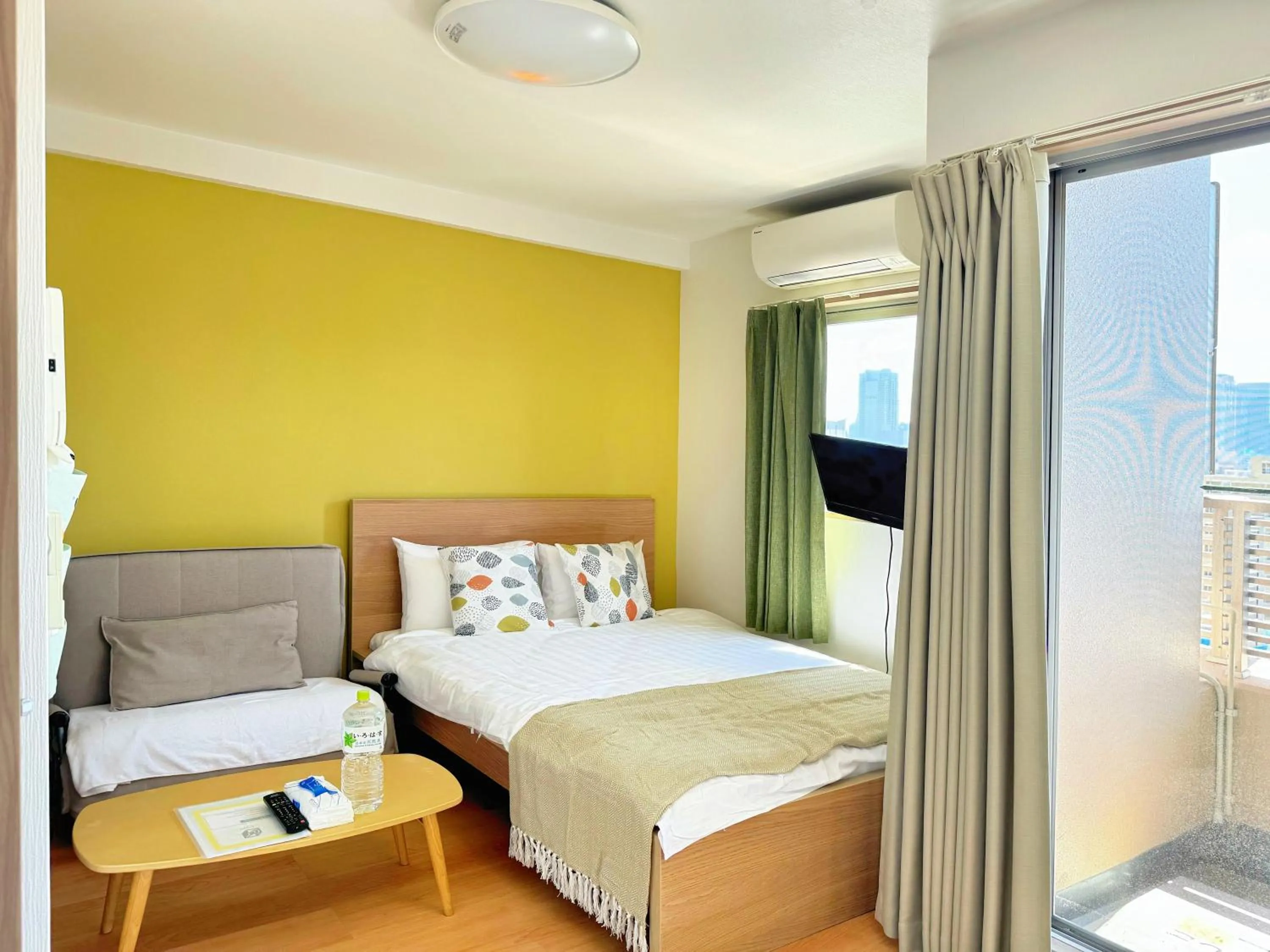 Bed in Juso AFP Apartment Hotel