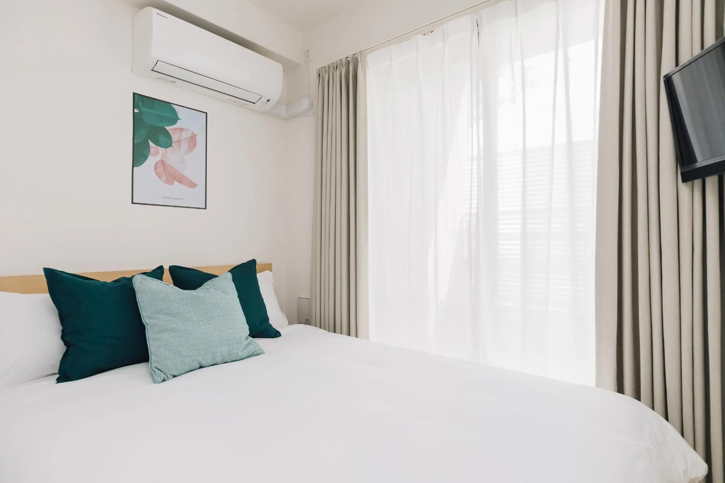 Bed in Juso AFP Apartment Hotel