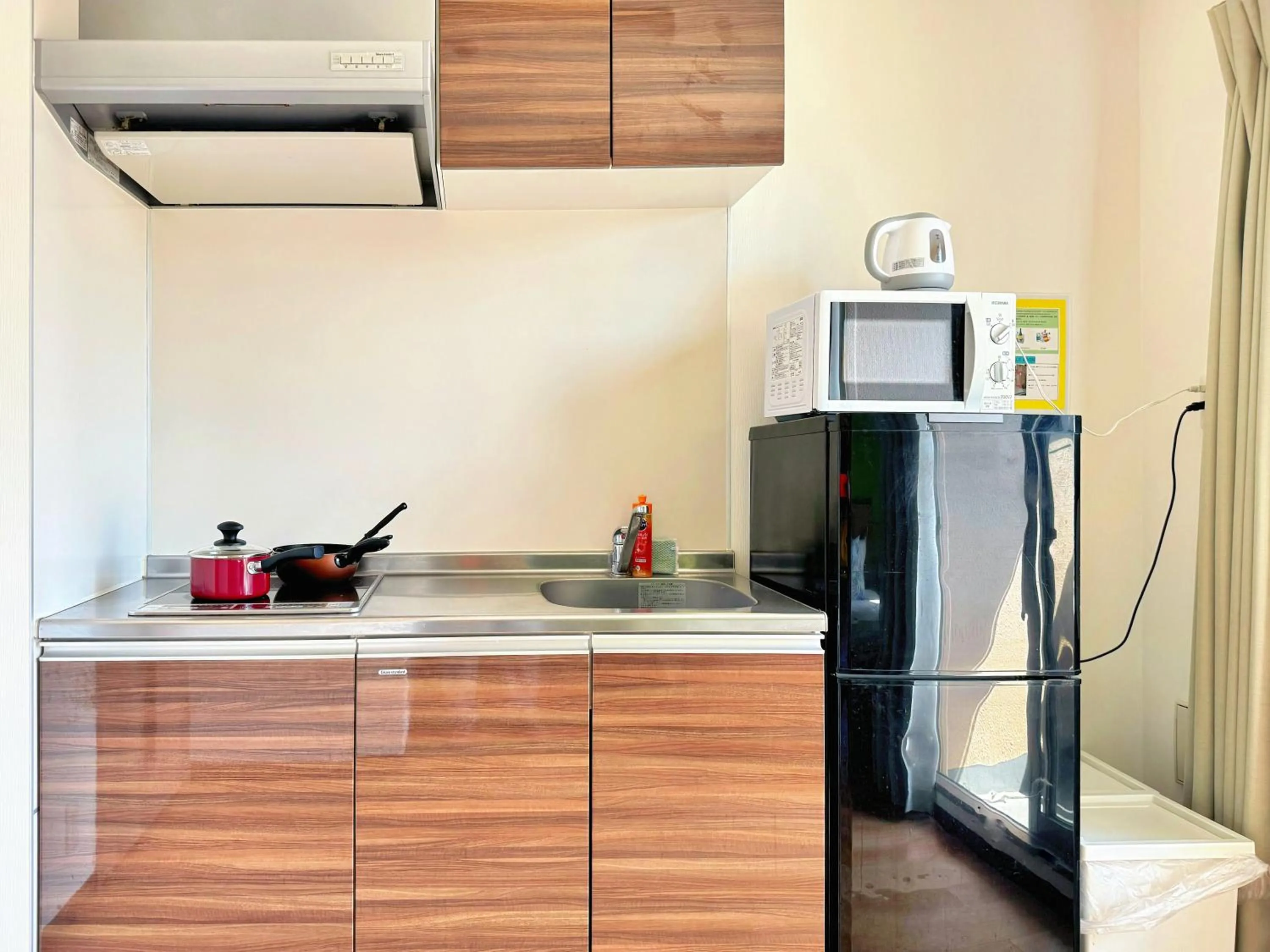 Kitchen or kitchenette in Juso AFP Apartment Hotel
