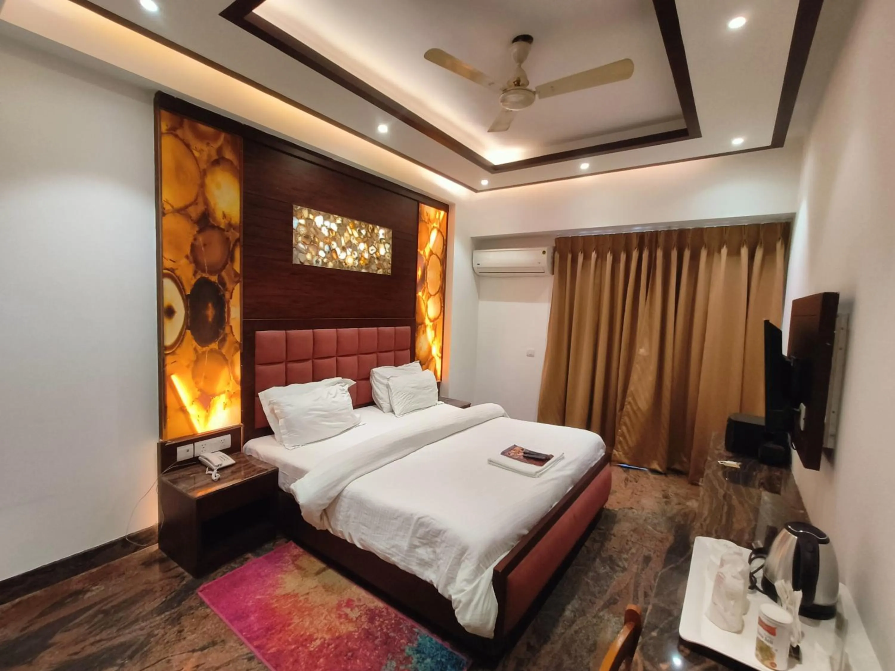 Bed in JJK Rukmini Vilas Hotel & Banquet