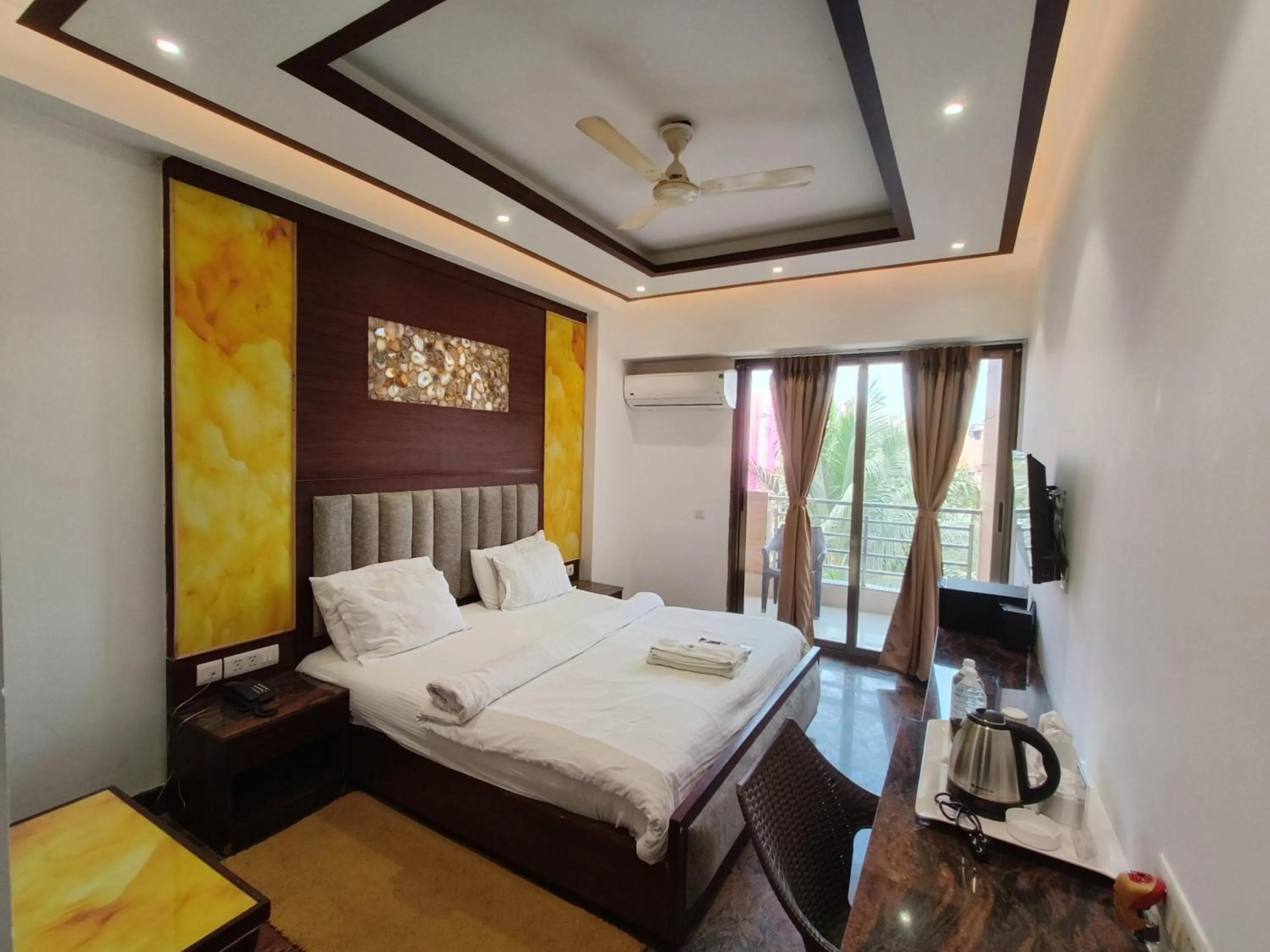 Bed in JJK Rukmini Vilas Hotel & Banquet