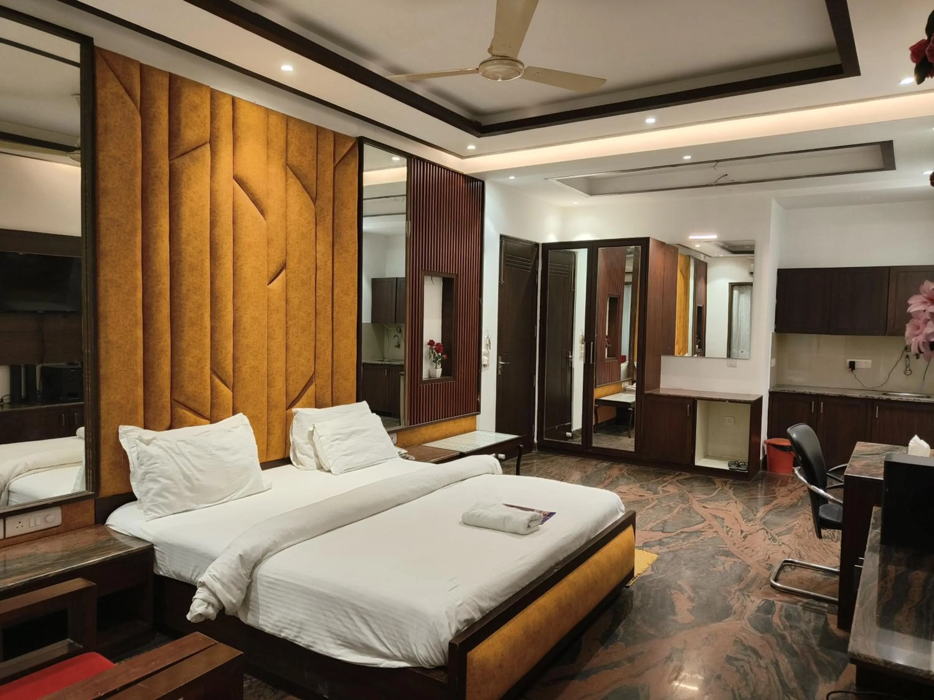 Bed in JJK Rukmini Vilas Hotel & Banquet