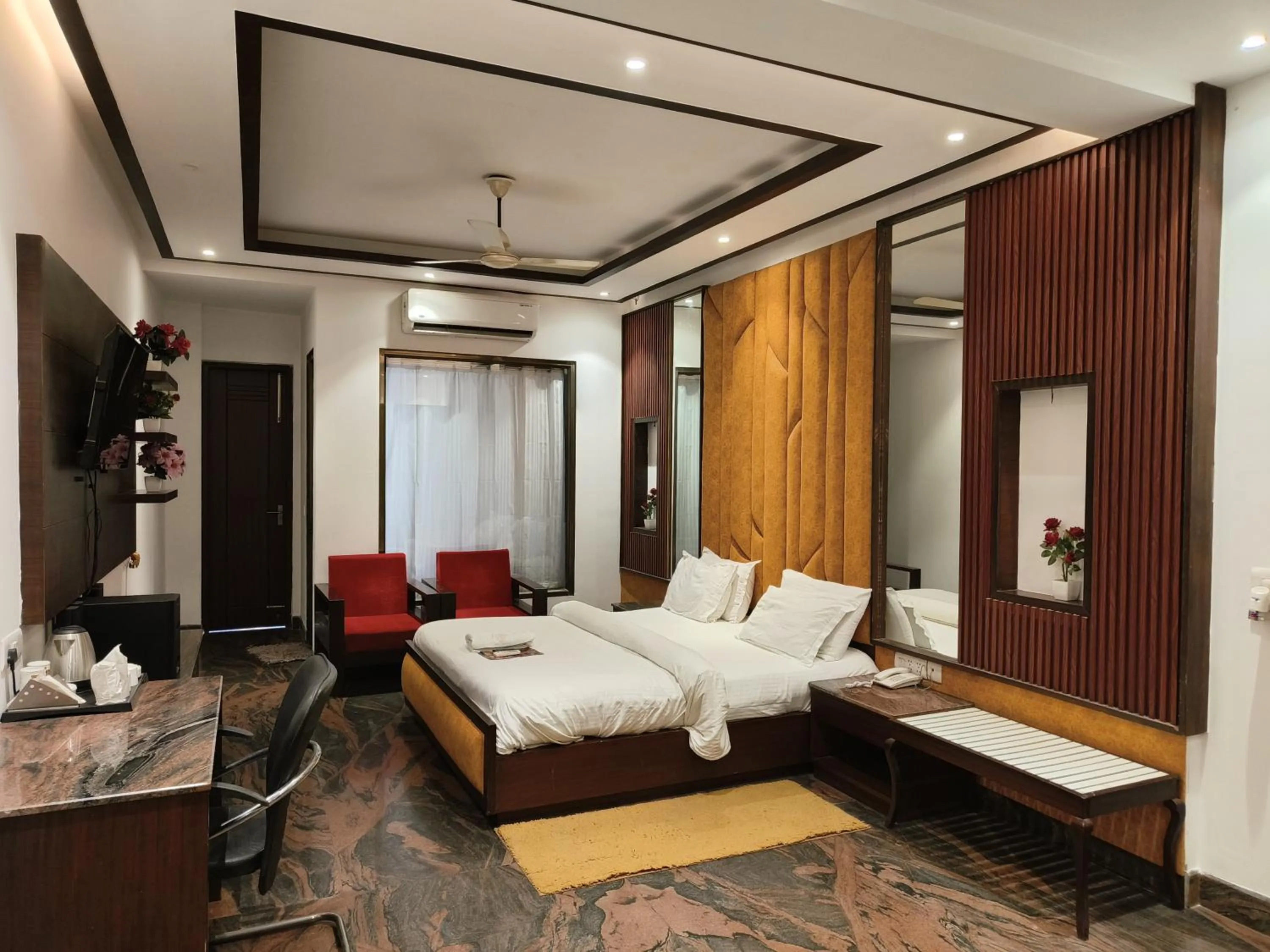 Bed in JJK Rukmini Vilas Hotel & Banquet