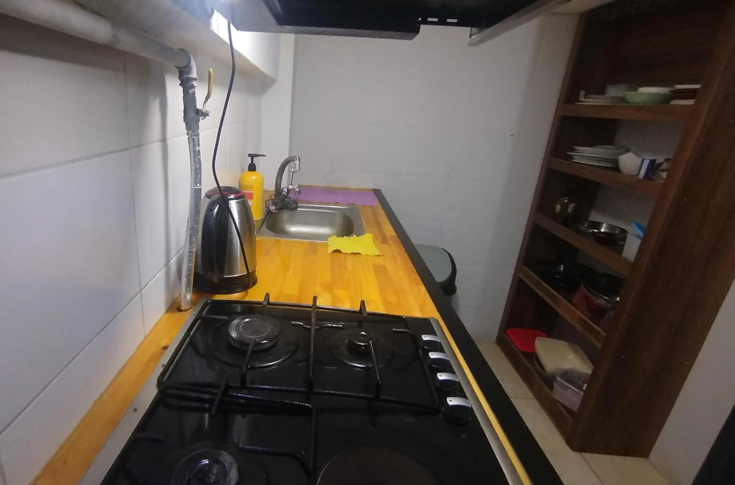 Communal kitchen in ivy hostel cafe