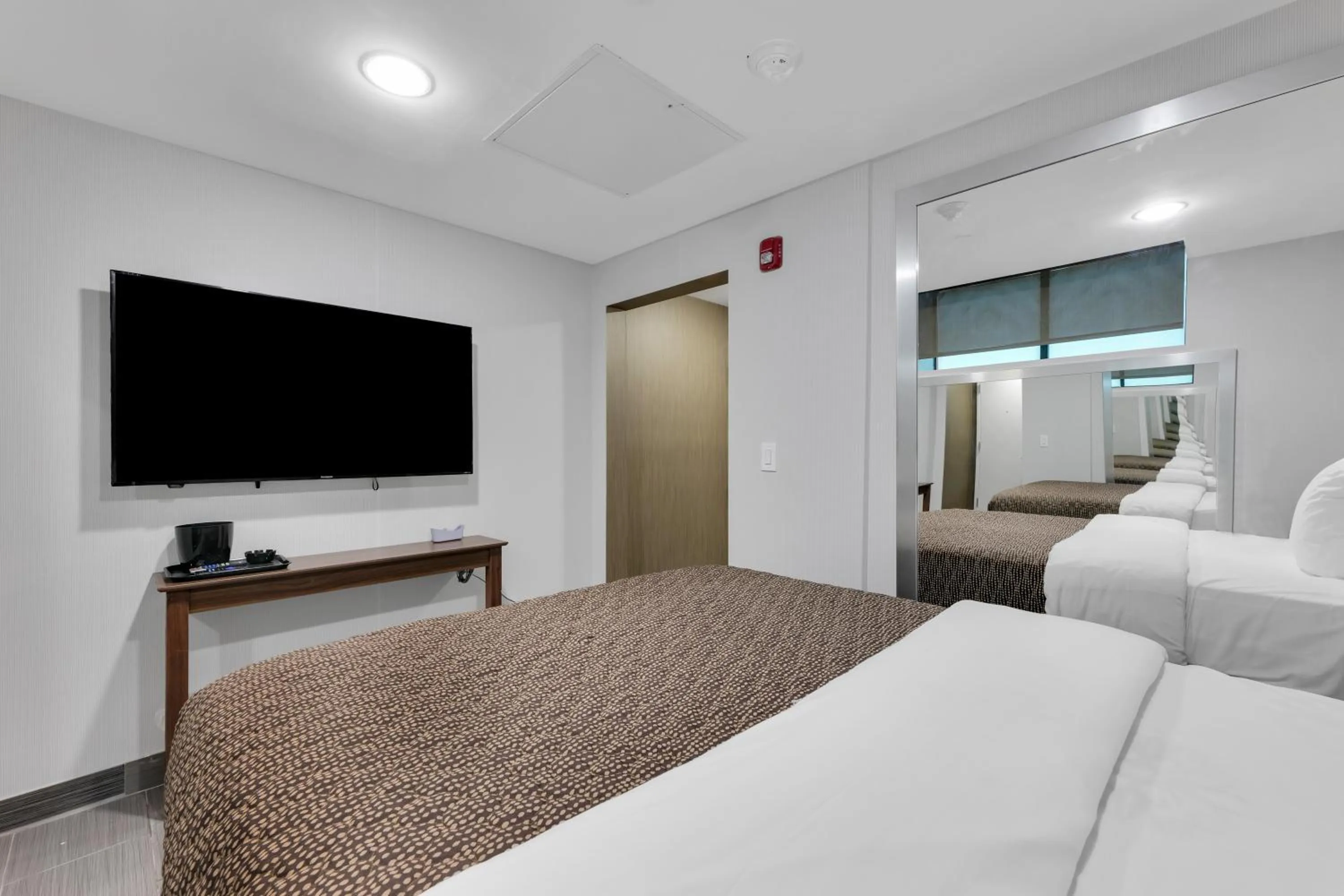 Bed in Hotel Mint JFK Airport