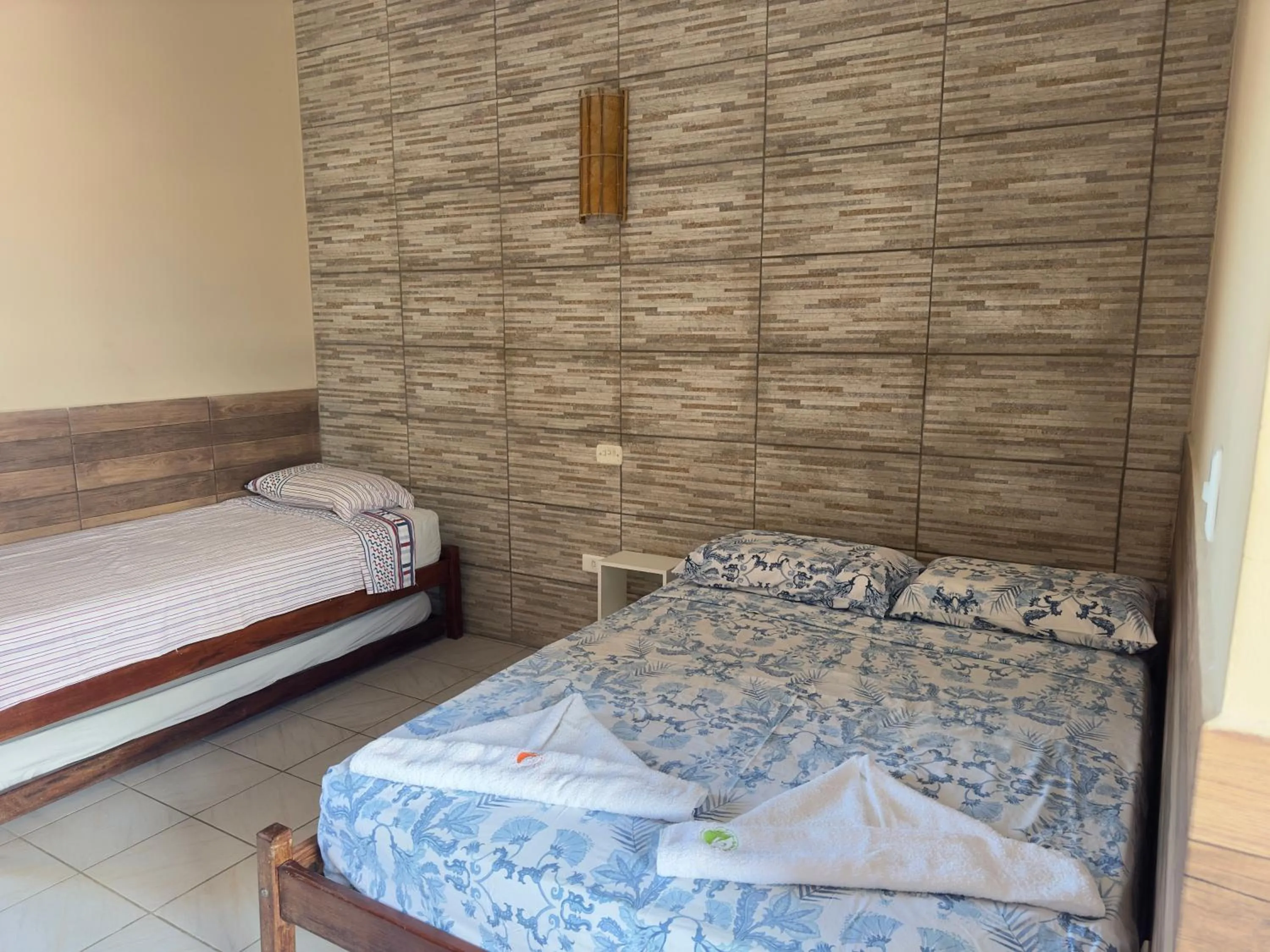 Bed in Pousada Boramar