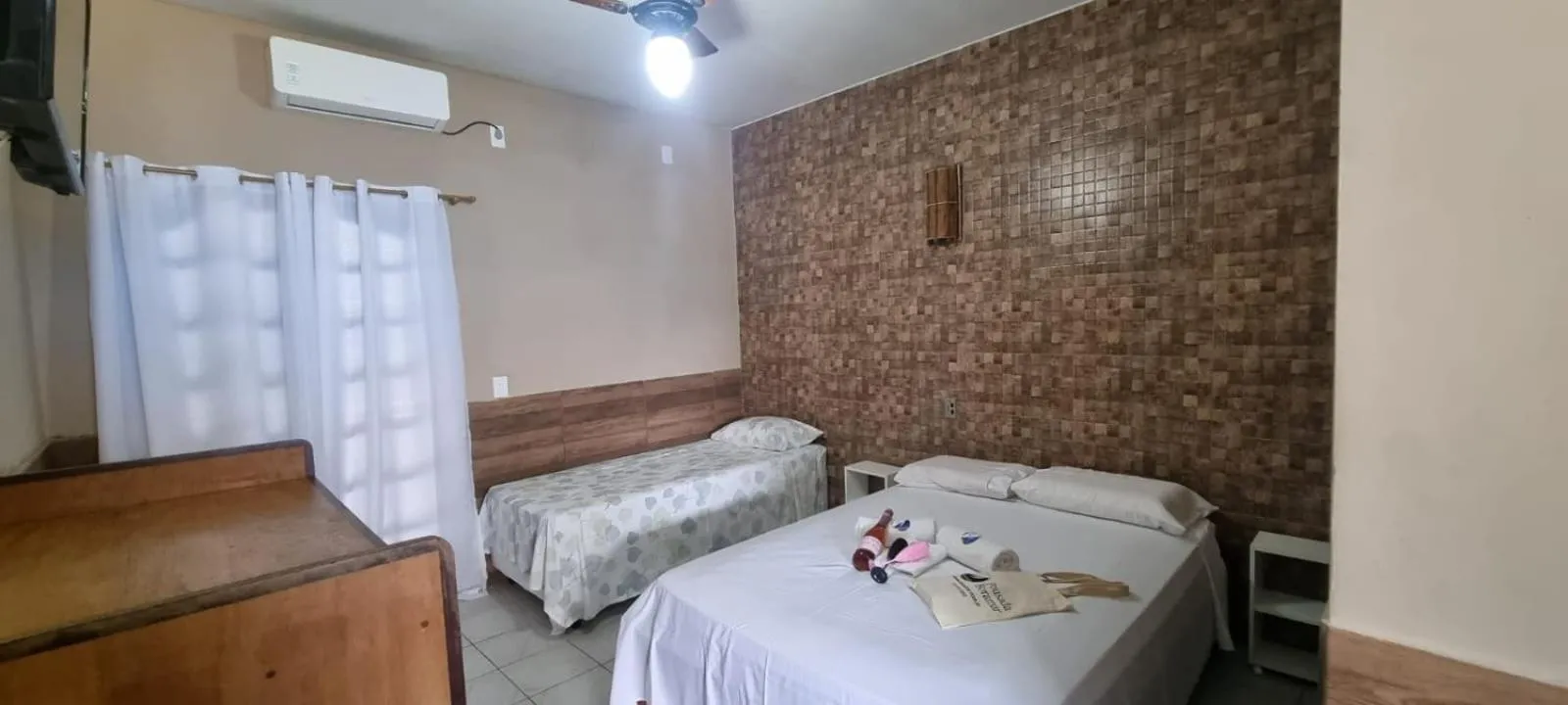Bed in Pousada Boramar