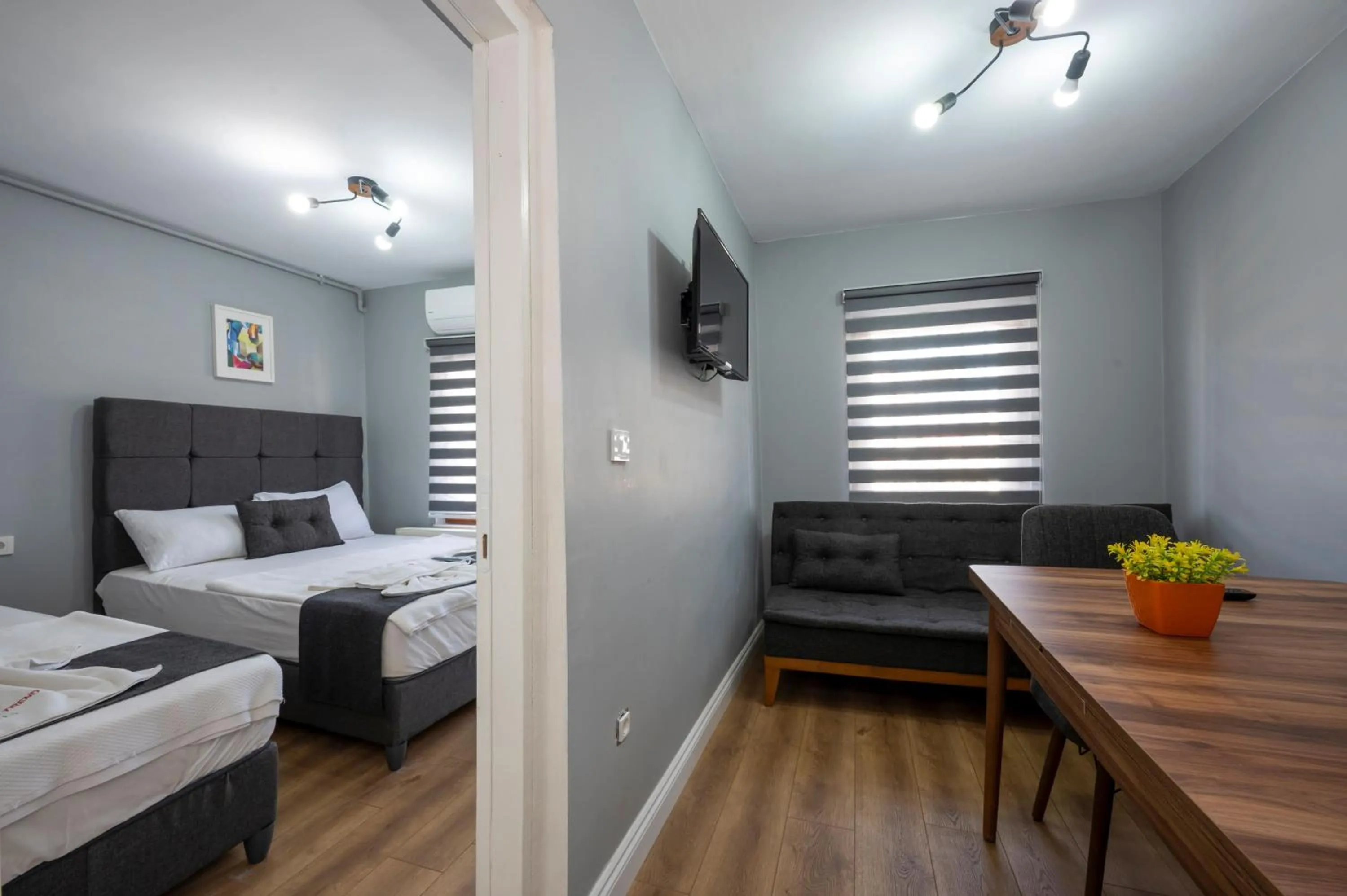 Seating area, Bed in Taxim Trend Suites