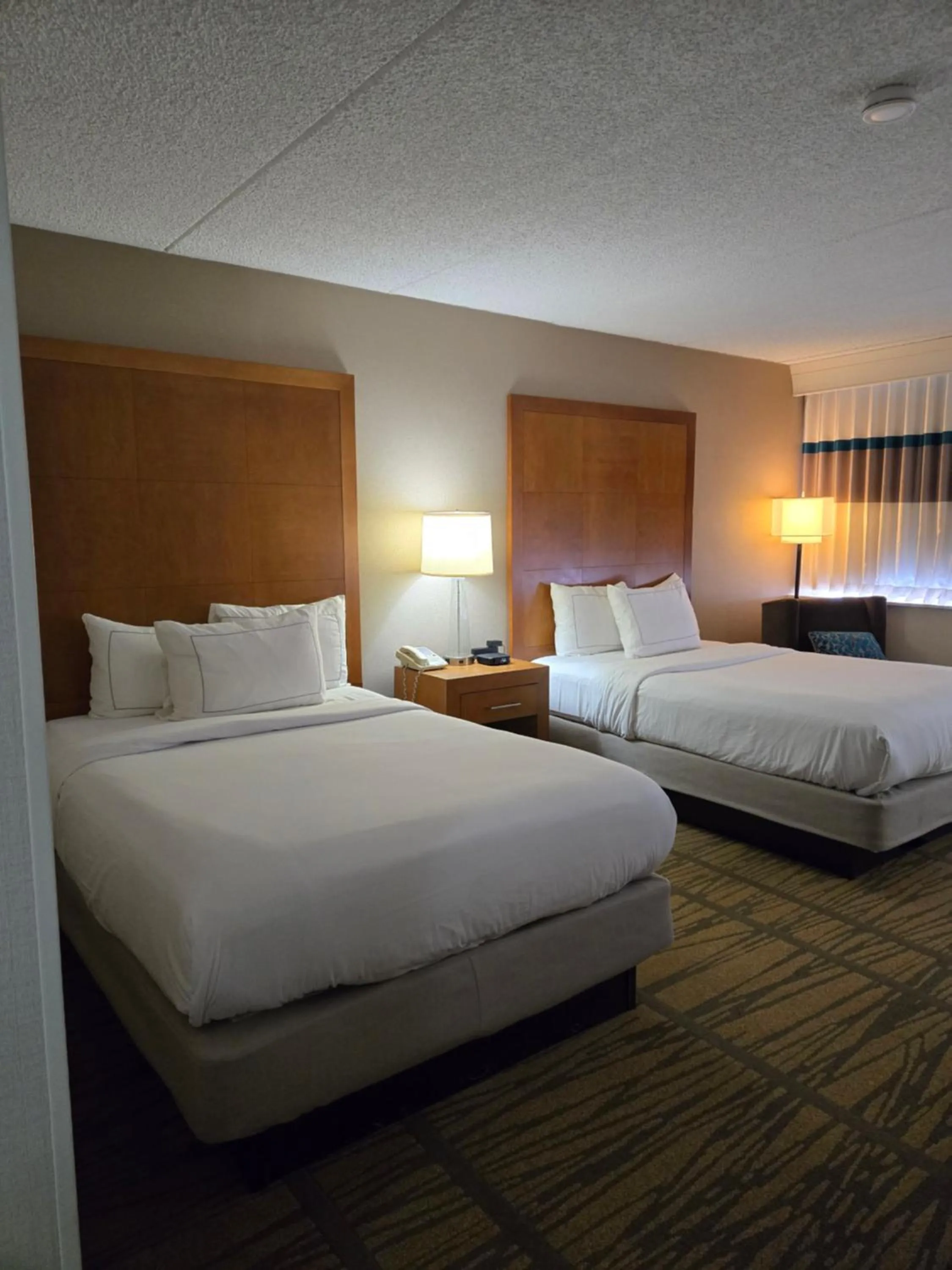 Bed in DoubleTree by Hilton Rochester