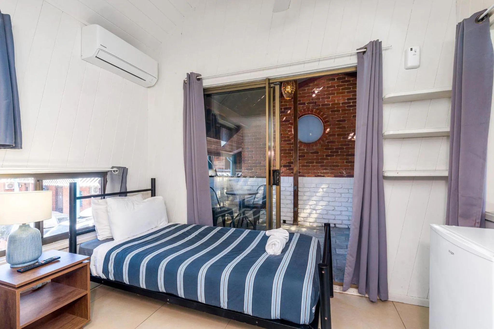 air conditioner, Bed in Aquarius Backpackers Resort
