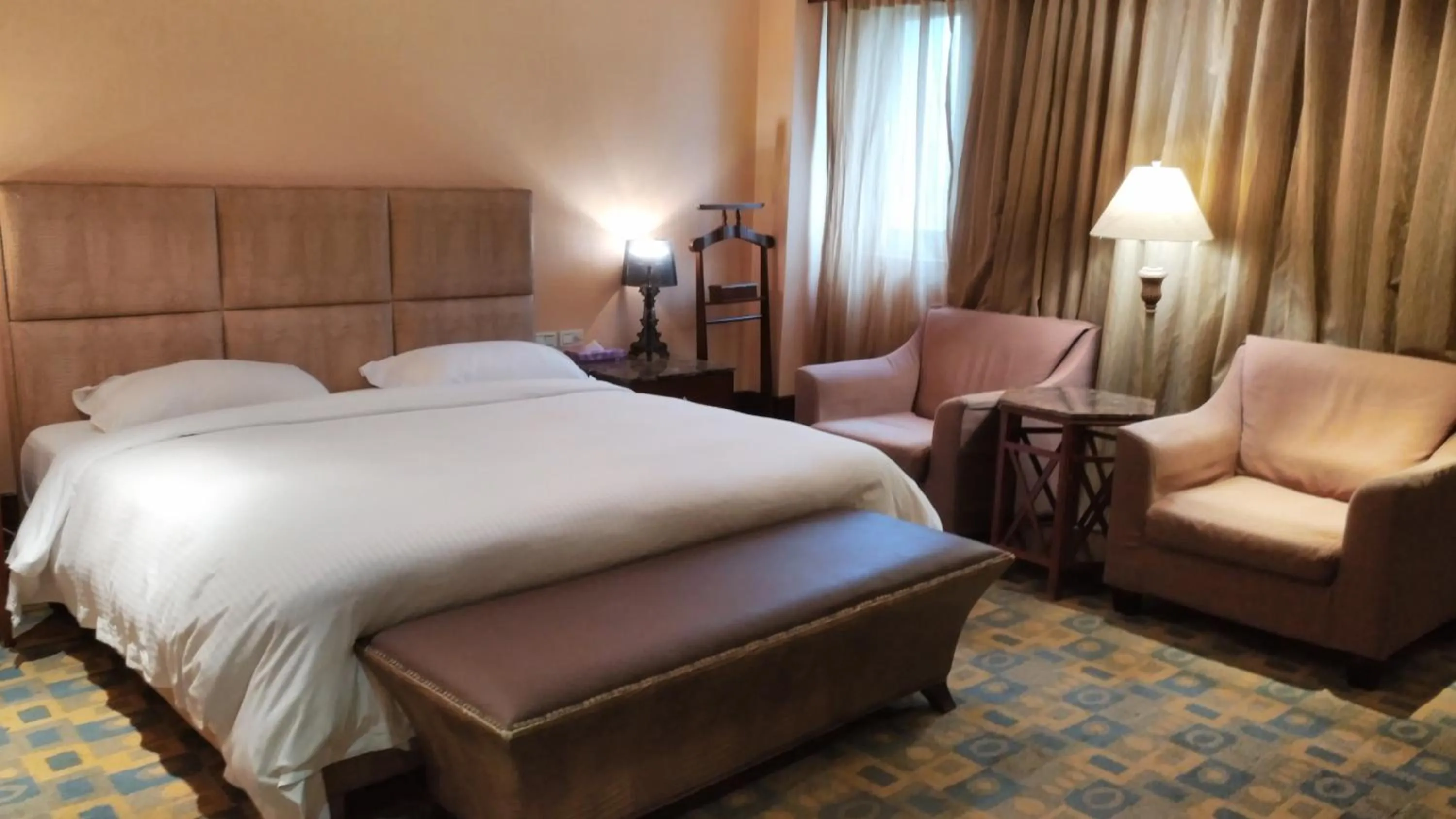 Bed in Kai Wei Boutique Hotel