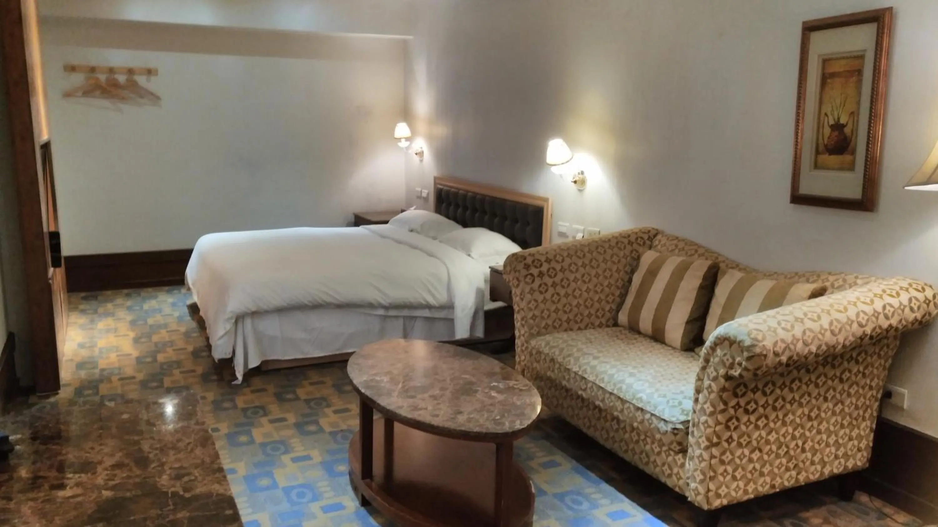 Bed in Kai Wei Boutique Hotel