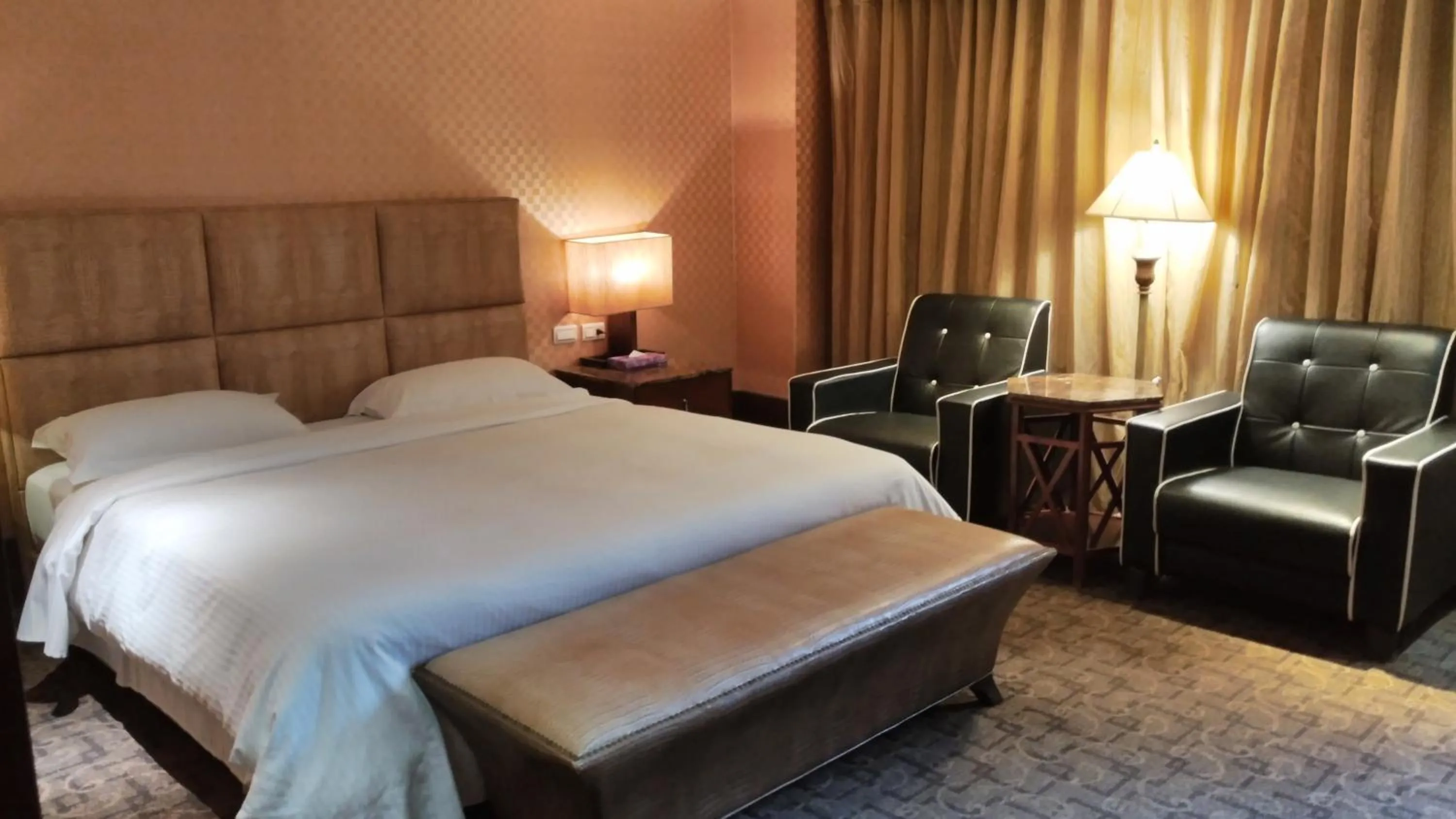 Bed in Kai Wei Boutique Hotel