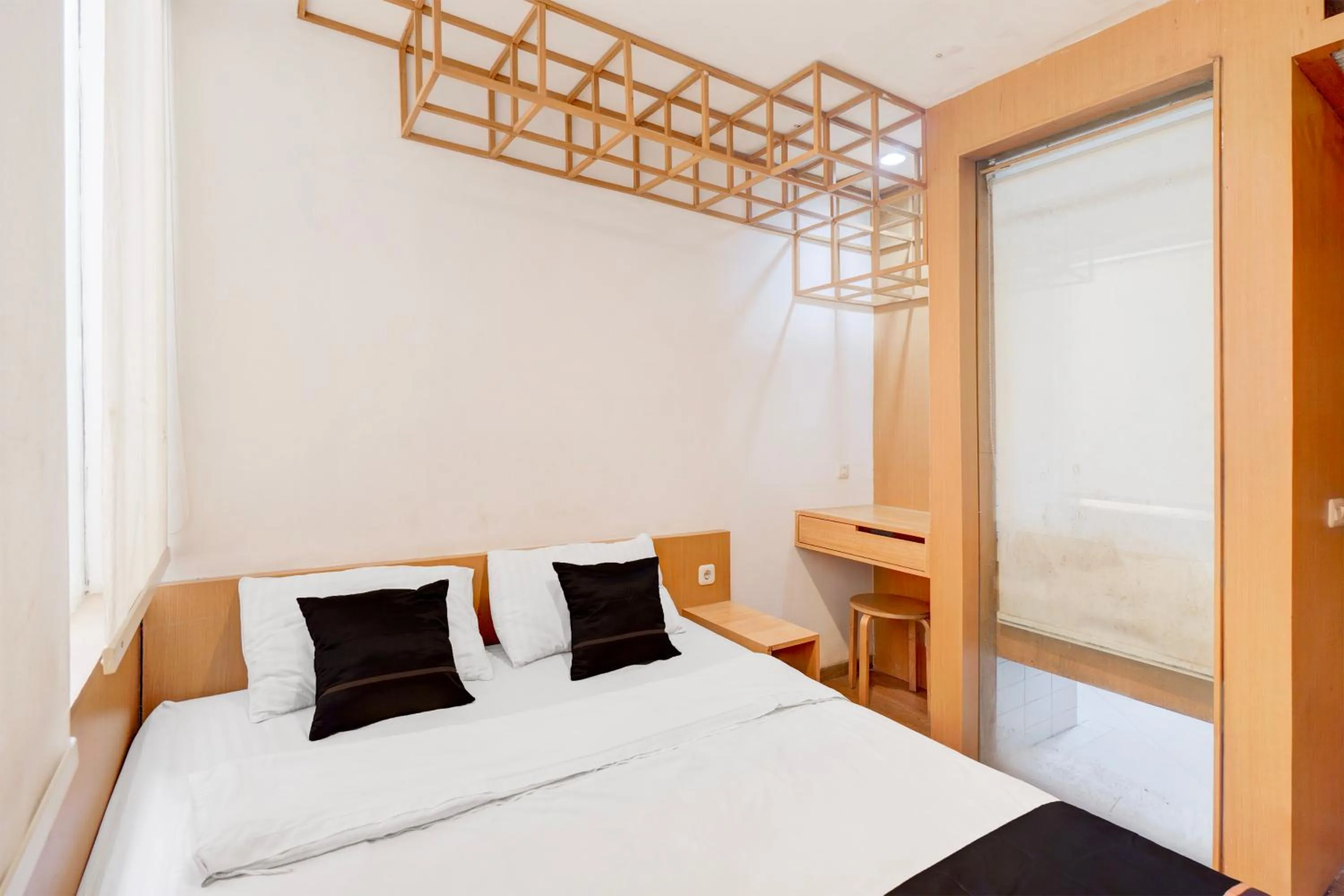 Photo of the whole room, Bed in Hotel O Pondok Indah Near Gandaria City Formerly Odori Residence