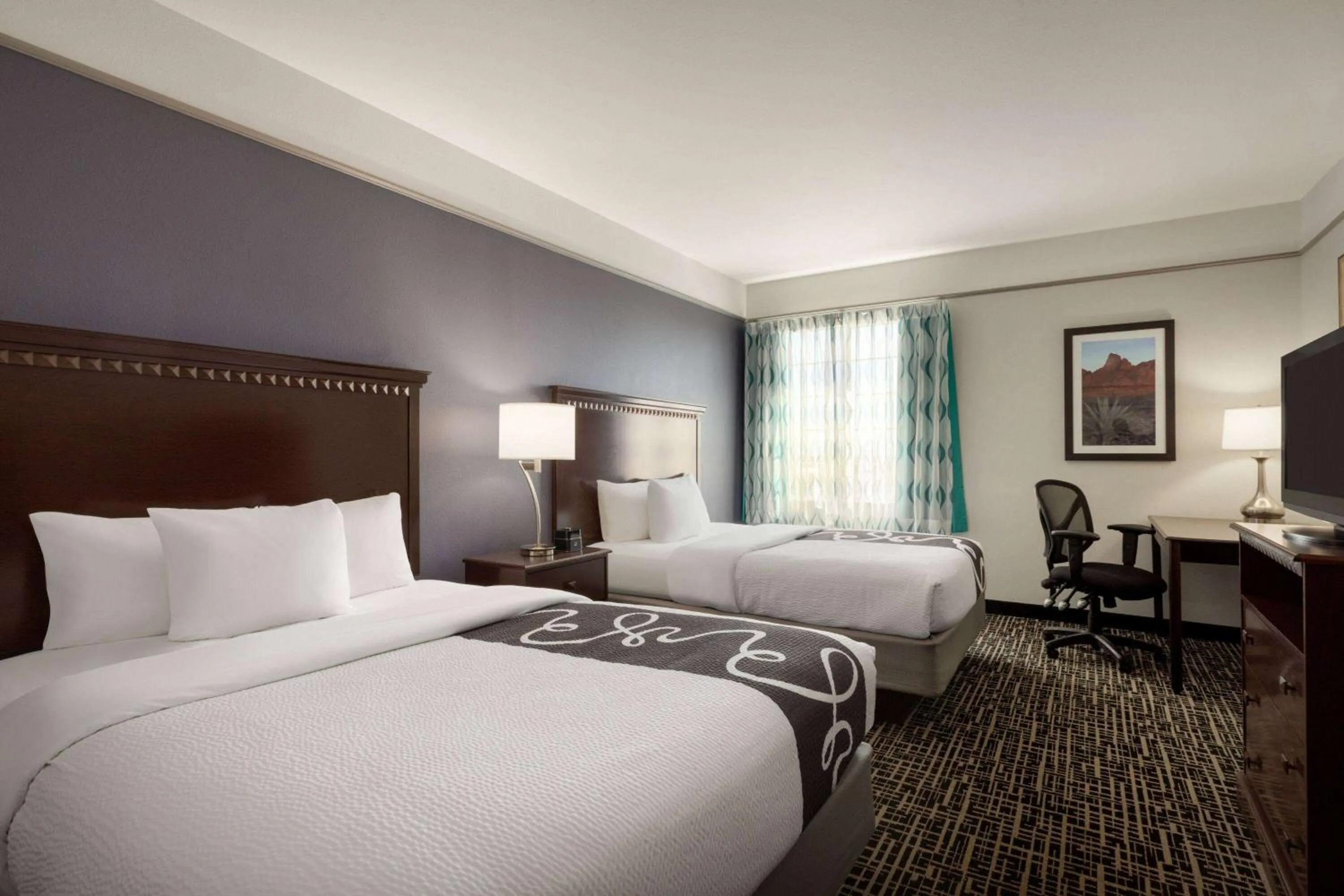 Photo of the whole room, Bed in La Quinta by Wyndham Dumas