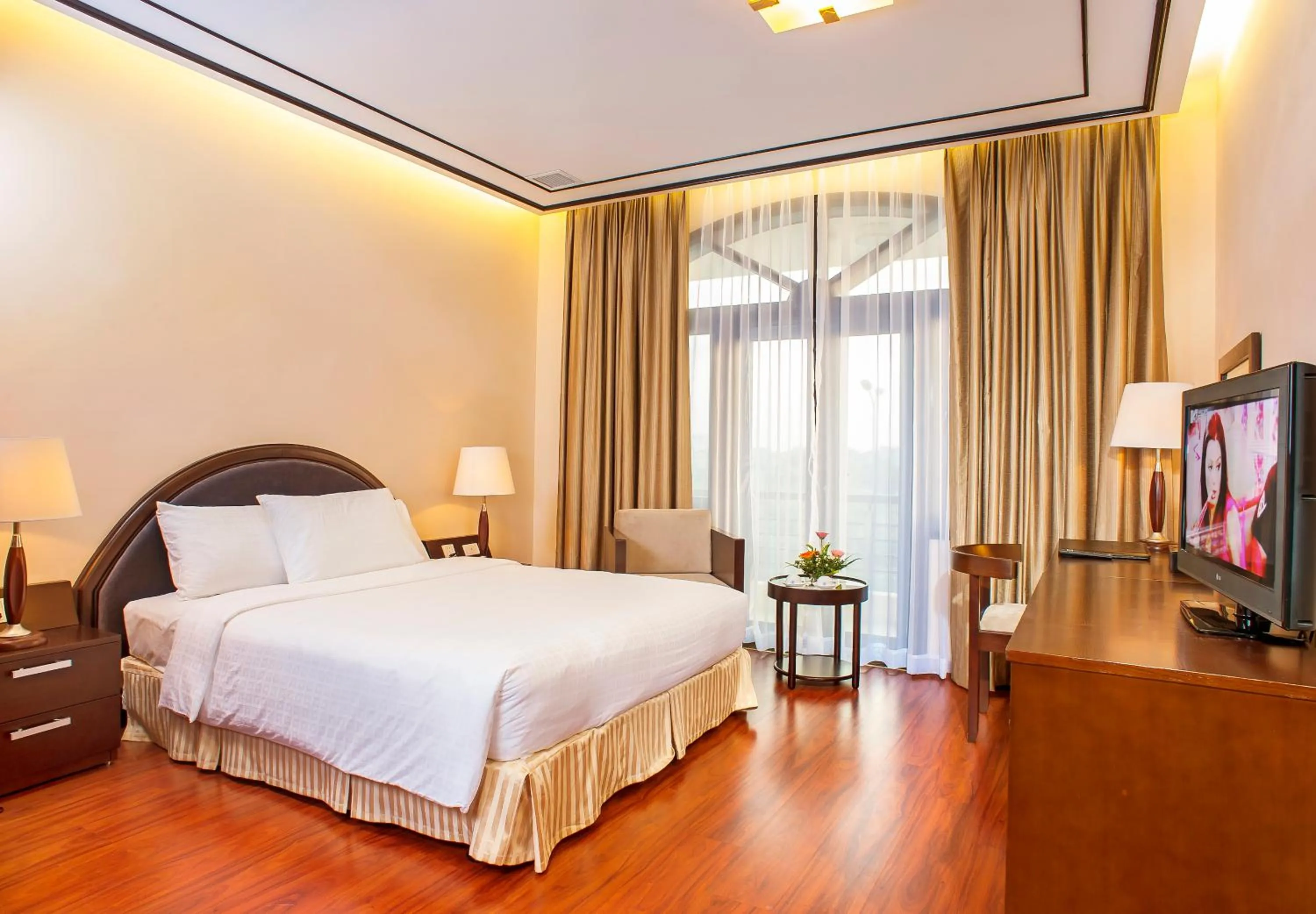 Bed in Garco Dragon Hotel