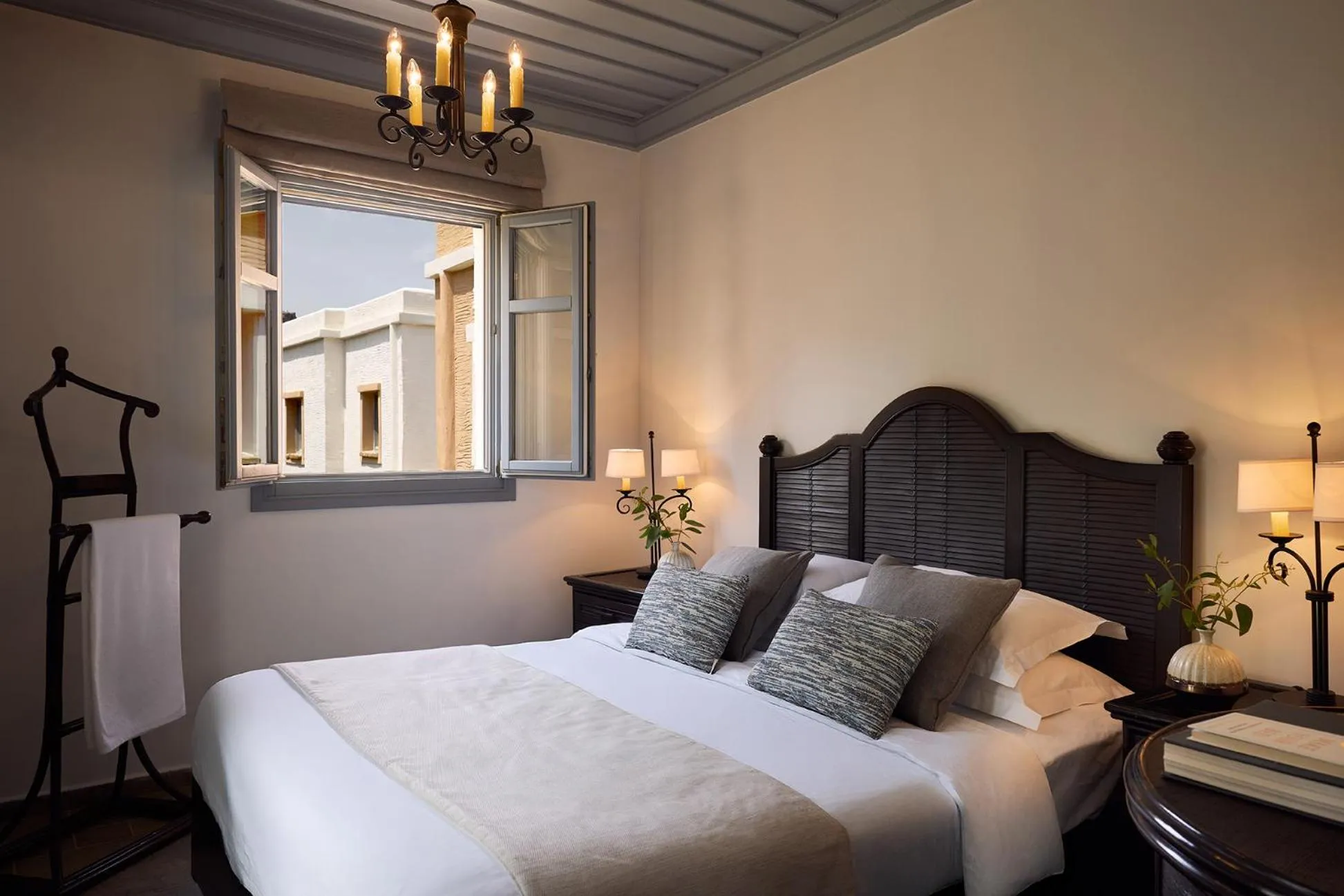 Bed in Porto Kea Suites by Sandglass