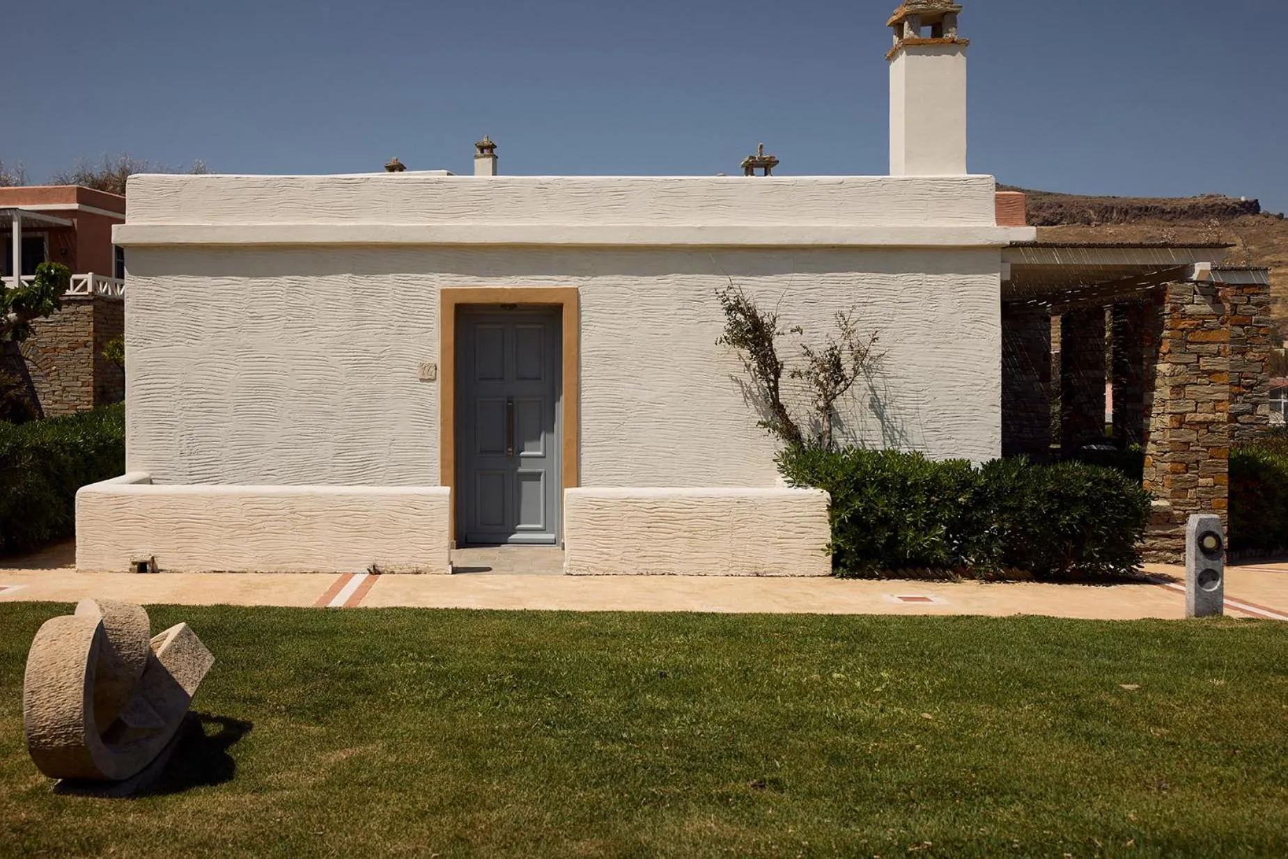 Property building in Porto Kea Suites by Sandglass