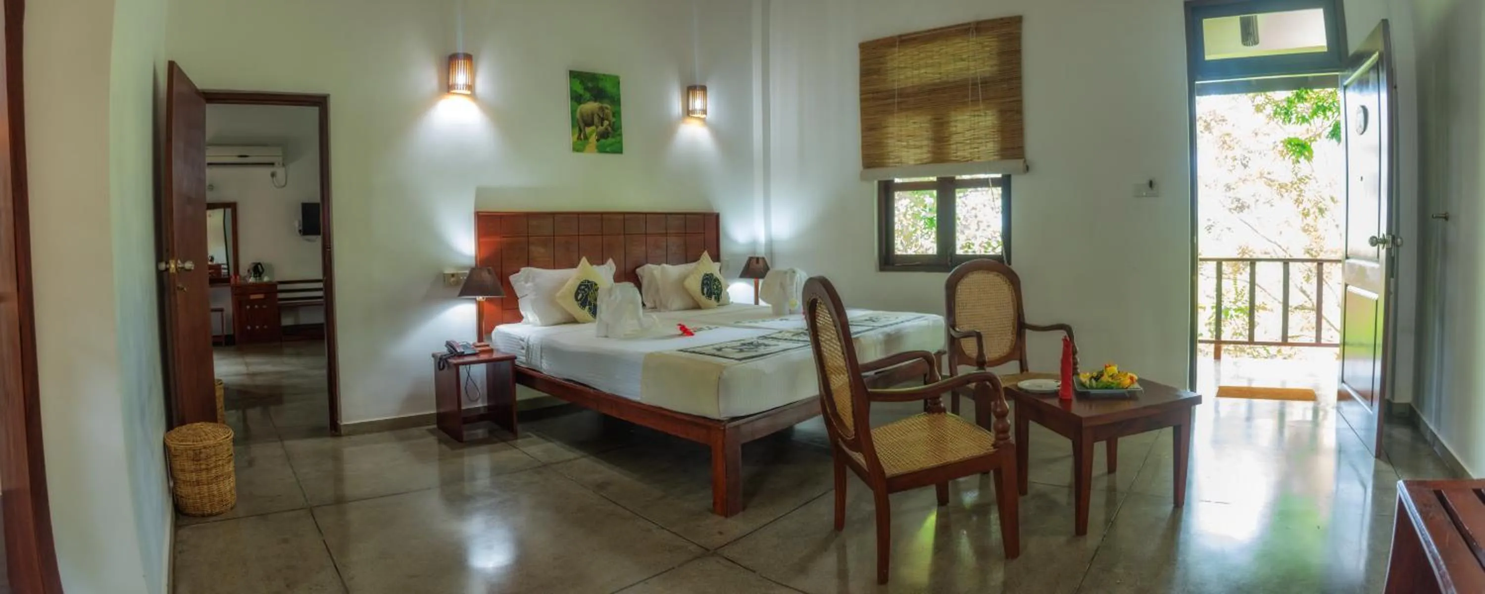 Bed in Camellia Resort And Spa