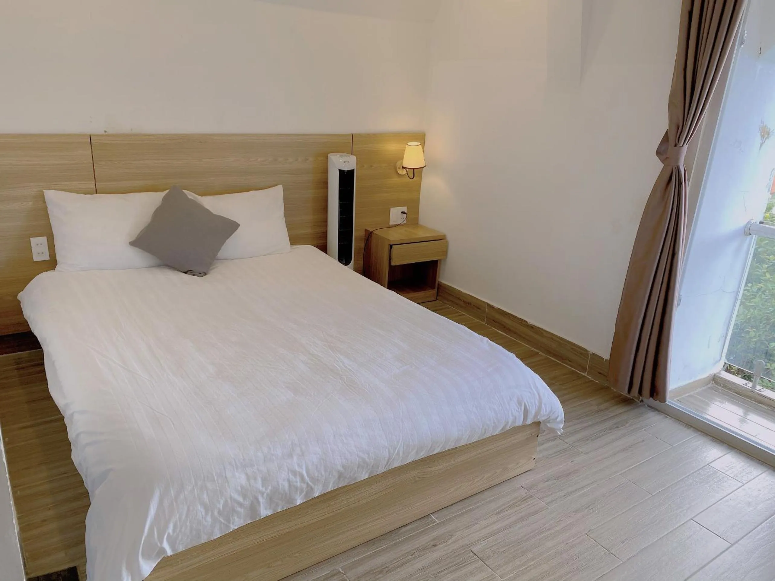 Bed in Lacami Dalat Hotel