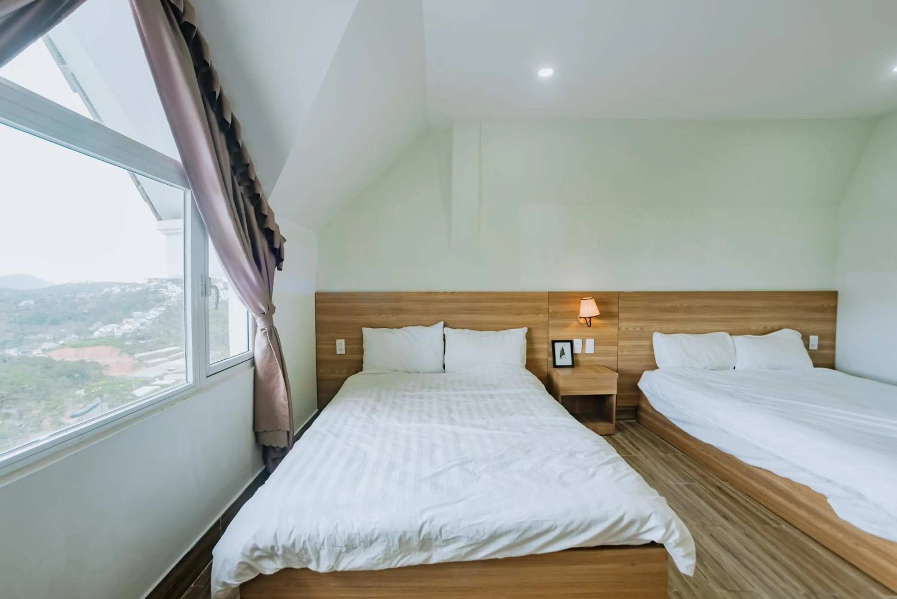 Photo of the whole room, Bed in Lacami Dalat Hotel