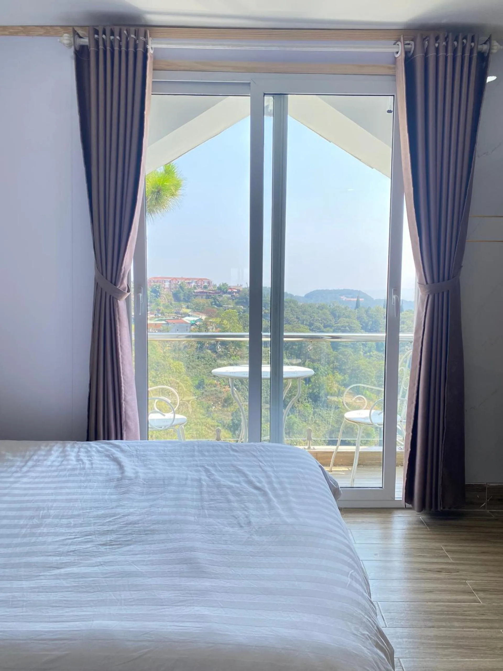 Bed in Lacami Dalat Hotel