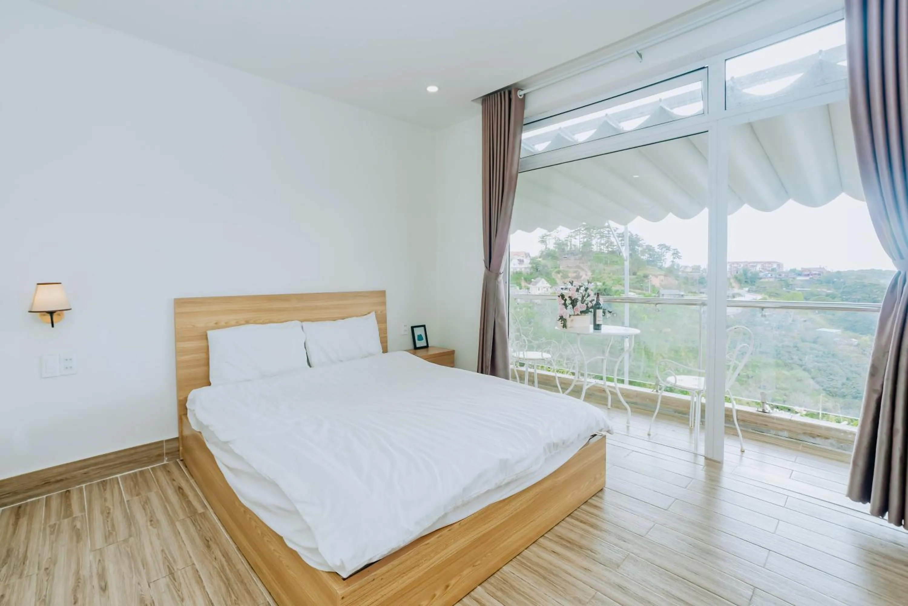 Bed in Lacami Dalat Hotel