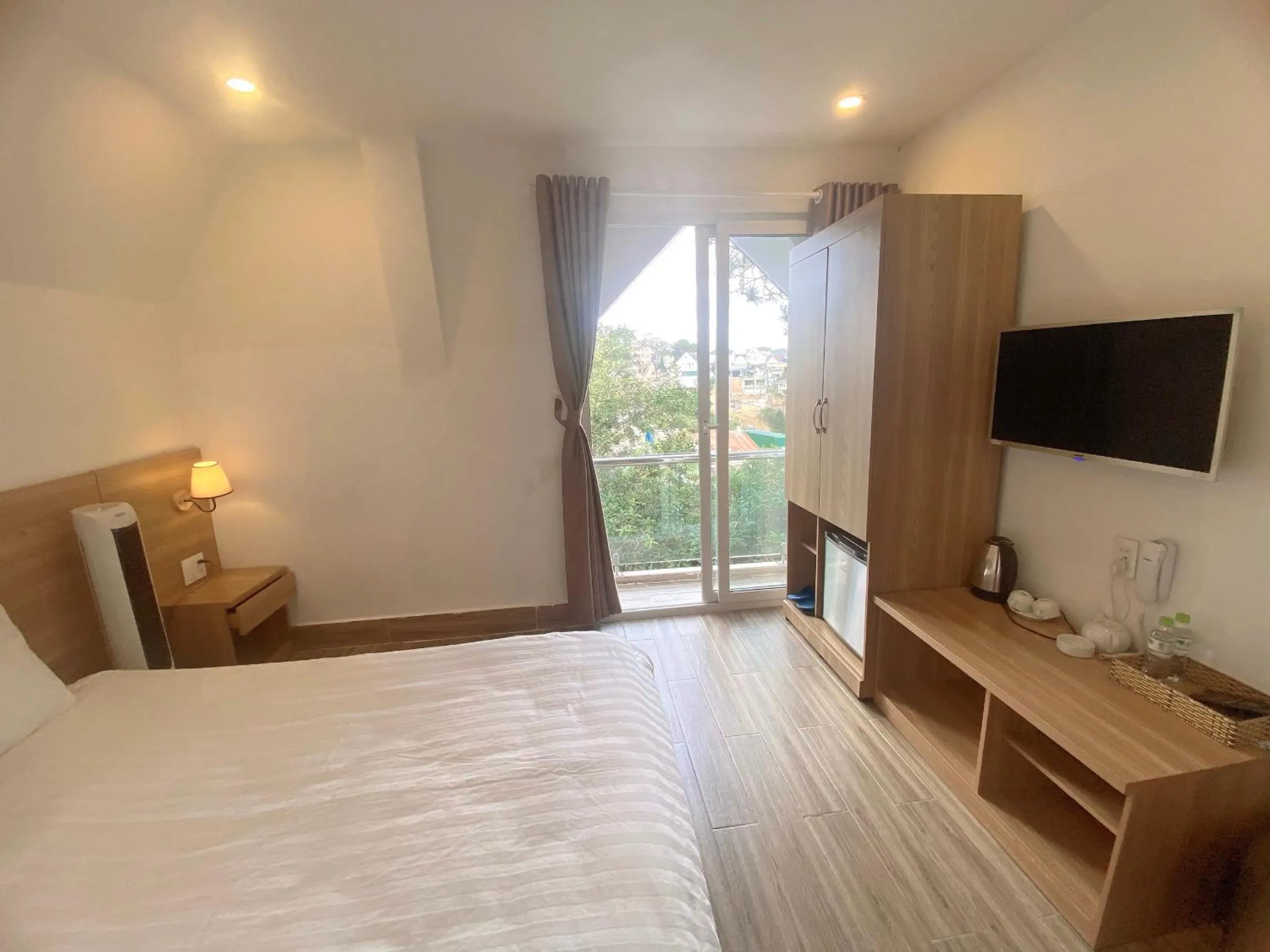 Photo of the whole room, Bed in Lacami Dalat Hotel