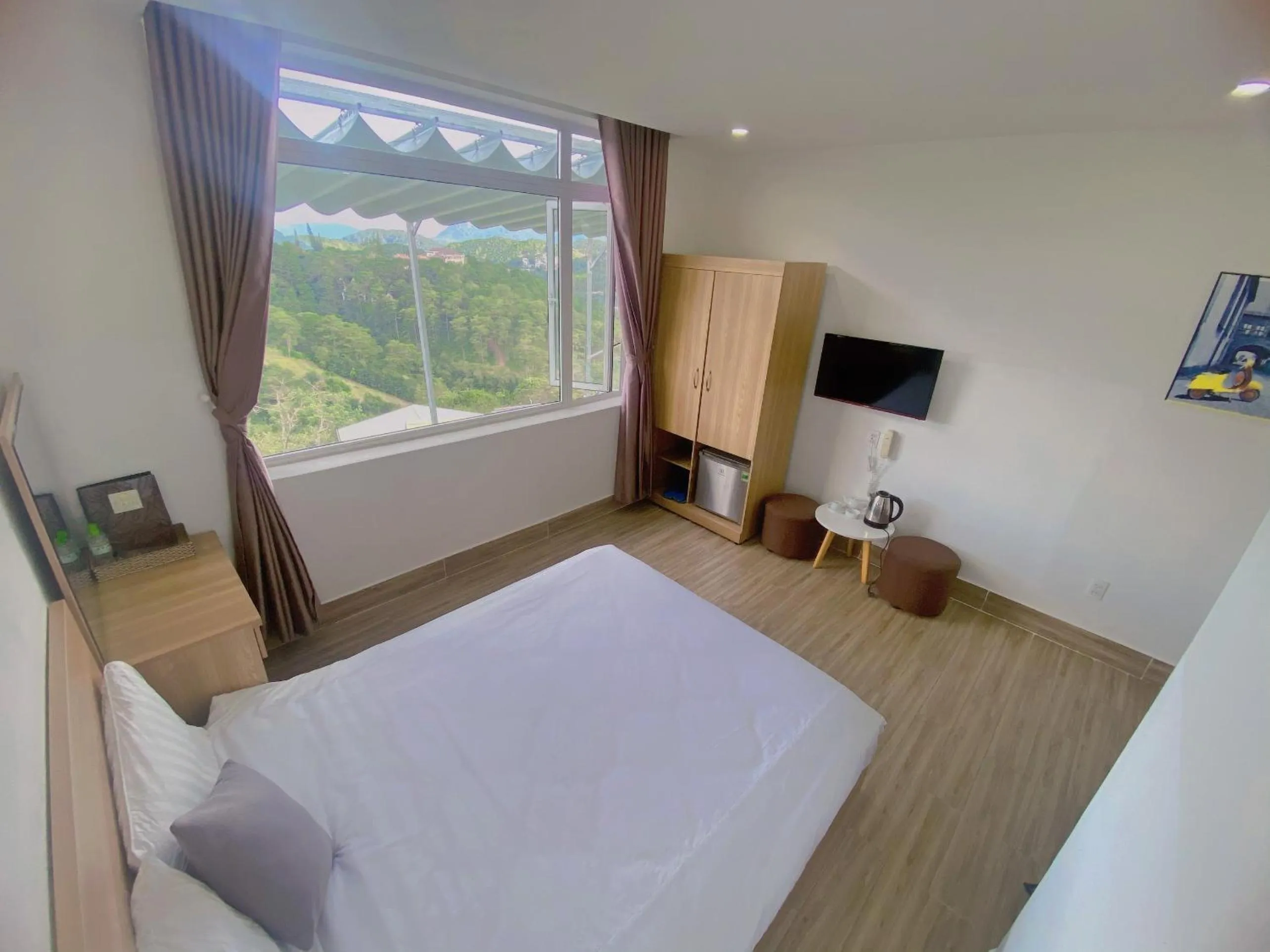 Photo of the whole room, Bed in Lacami Dalat Hotel