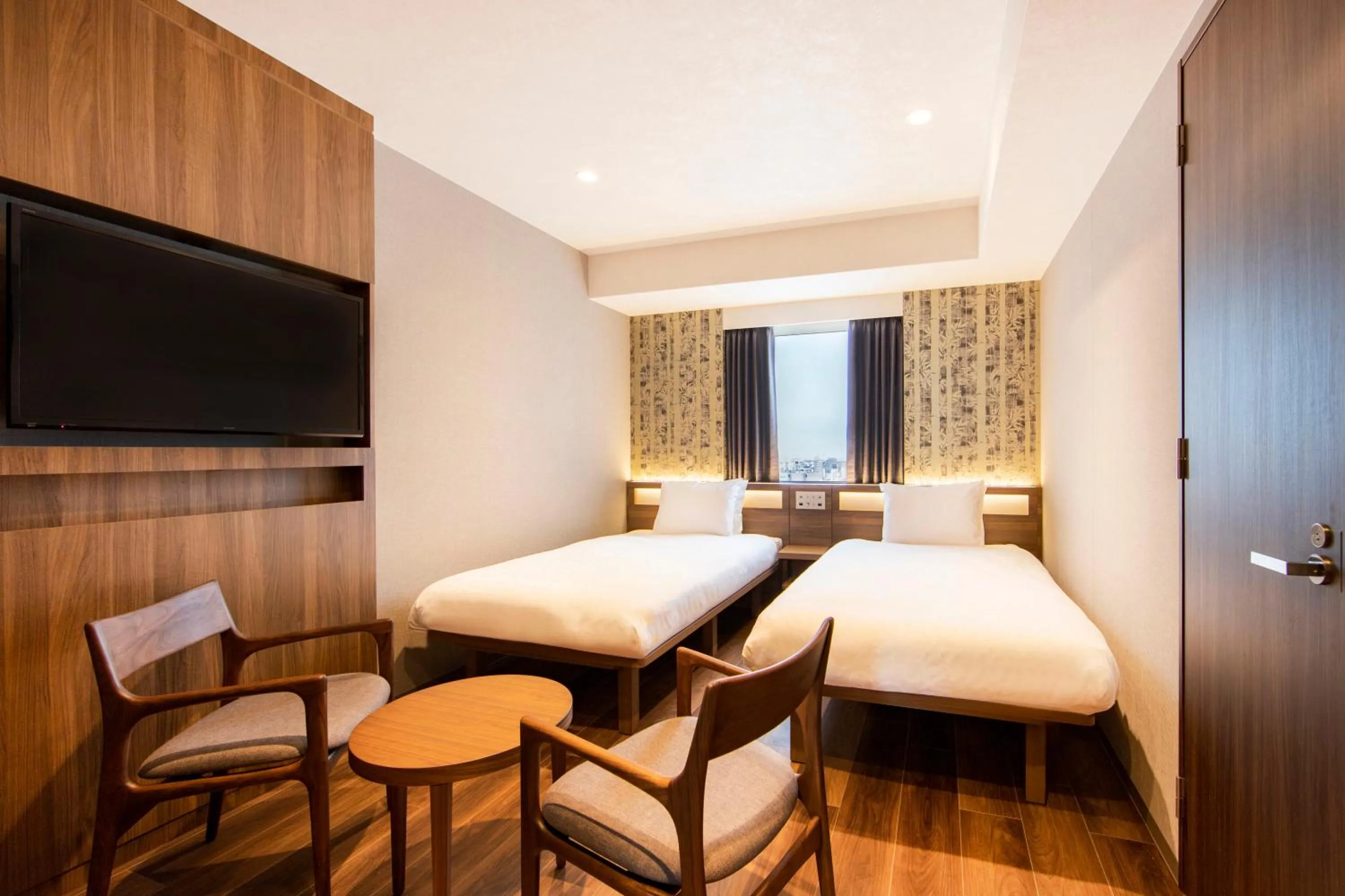 Photo of the whole room, Bed in karaksa hotel grande Shin-Osaka Tower