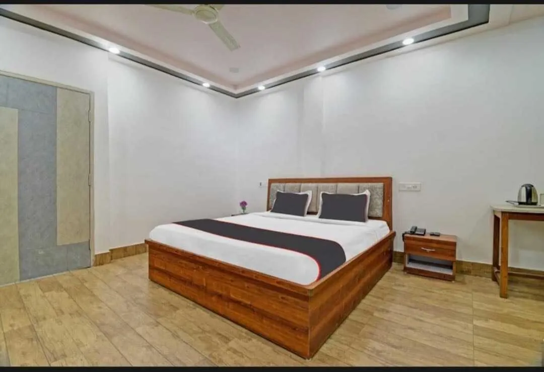 Bedroom in Collection O Megha Resort