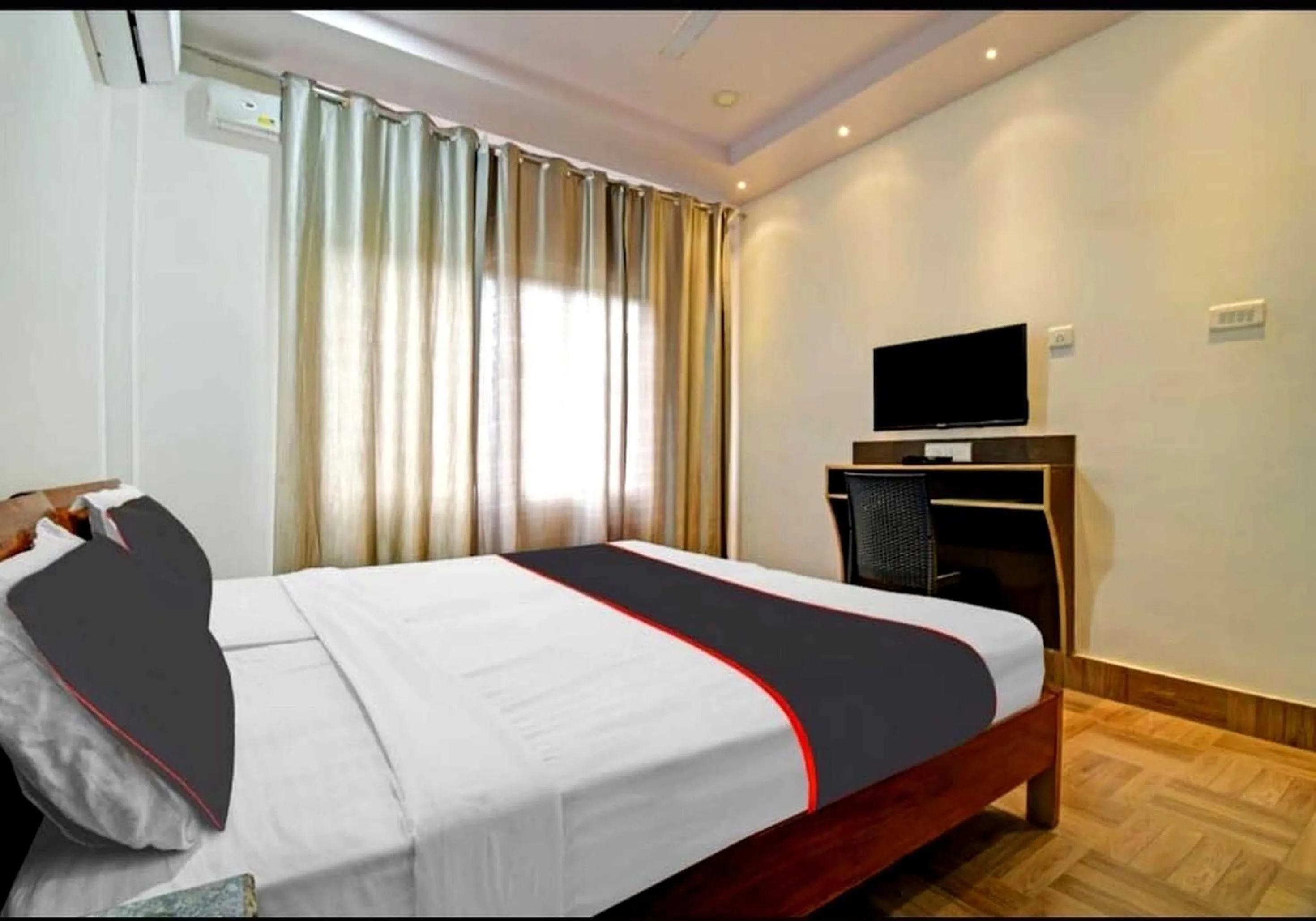 Bedroom in Collection O Megha Resort