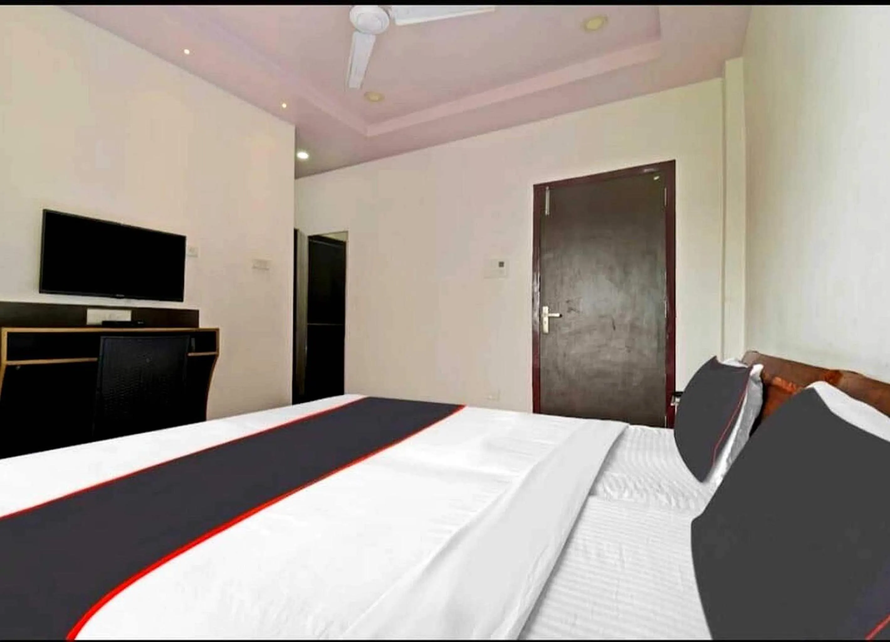 Bedroom in Collection O Megha Resort